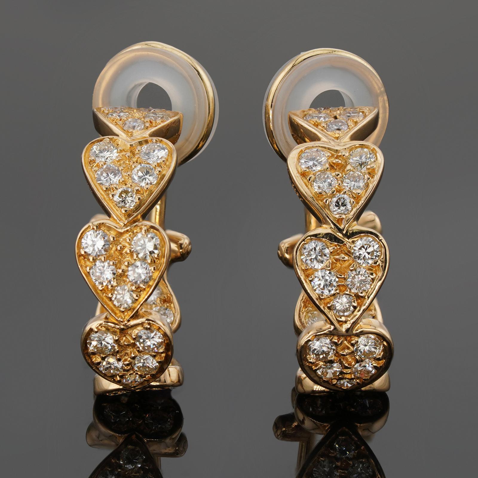 These fabulous Cartier earrings from the romantic Virgo collection feature heart-shaped wrap earrings crafted in 18k yellow gold and set with round brilliant E-F-G VVS1-VVS2 diamonds weighing an estimated 1.0 carat. Made in France circa 2000s. Posts