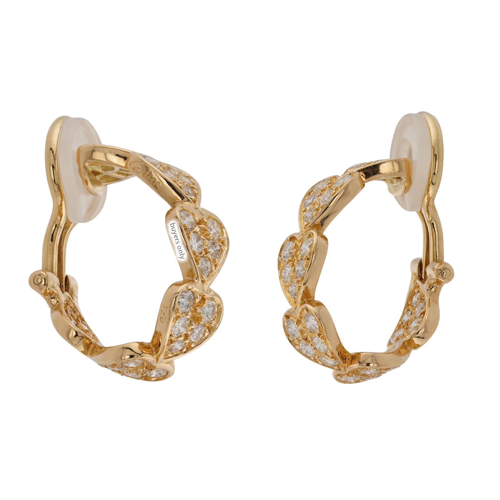 CARTIER Virgo Diamond Yellow Gold Heart Wrap Earrings In Excellent Condition For Sale In New York, NY