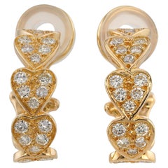 Boucles d'oreilles cARTIER Virgo en or jaune et diamants en forme de cœur