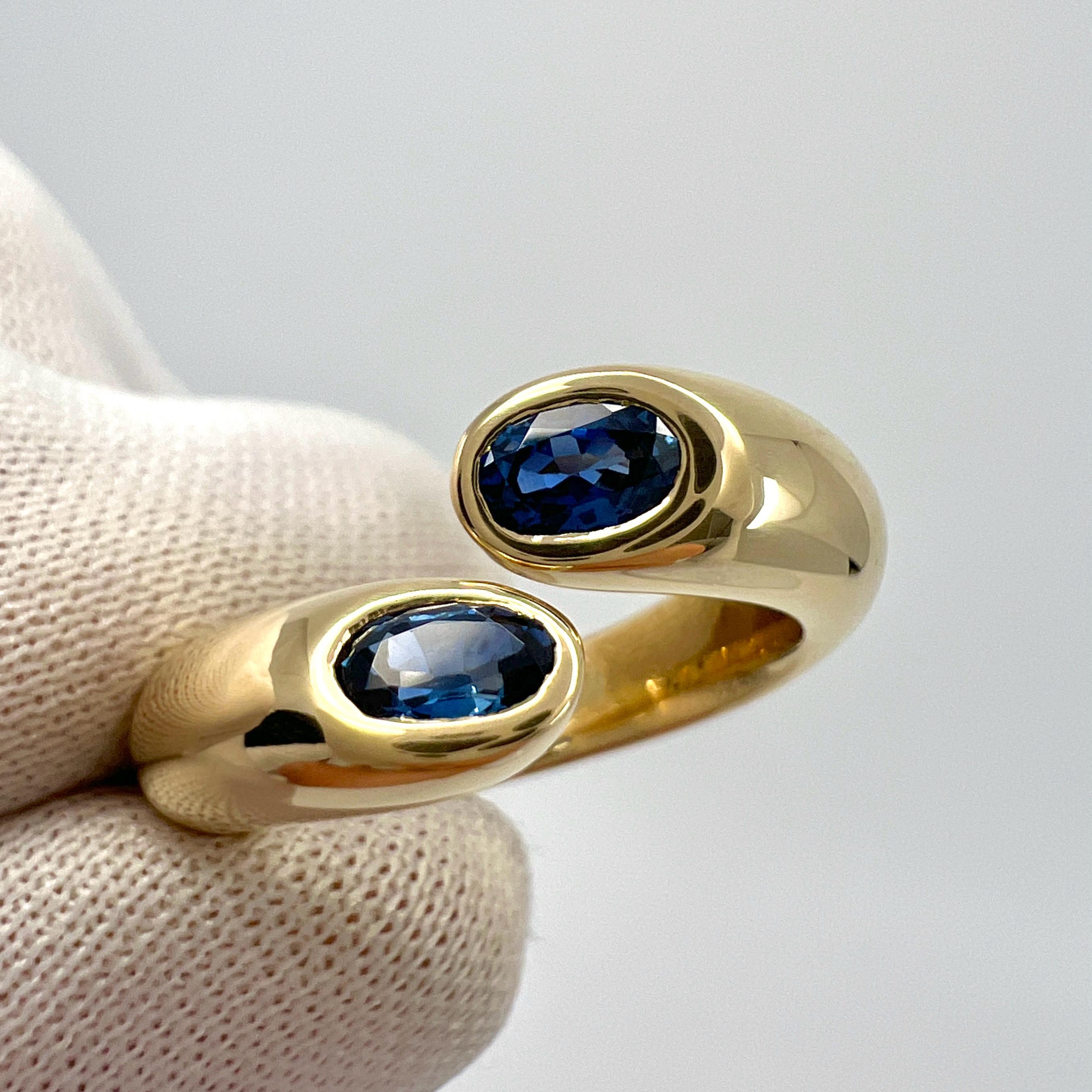 Rare Vintage Cartier Deep Blue Sapphire 18k Yellow Gold Bypass Ring.

Stunning yellow gold ring set with 2 fine vivid blue oval cut sapphires. Fine jewellery houses like Cartier only use the finest of gemstones in their jewellery and these sapphires