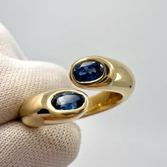 Cartier Vivid Blue Sapphire Oval Cut Ellipse 18k Gold Bypass Split Ring EU49