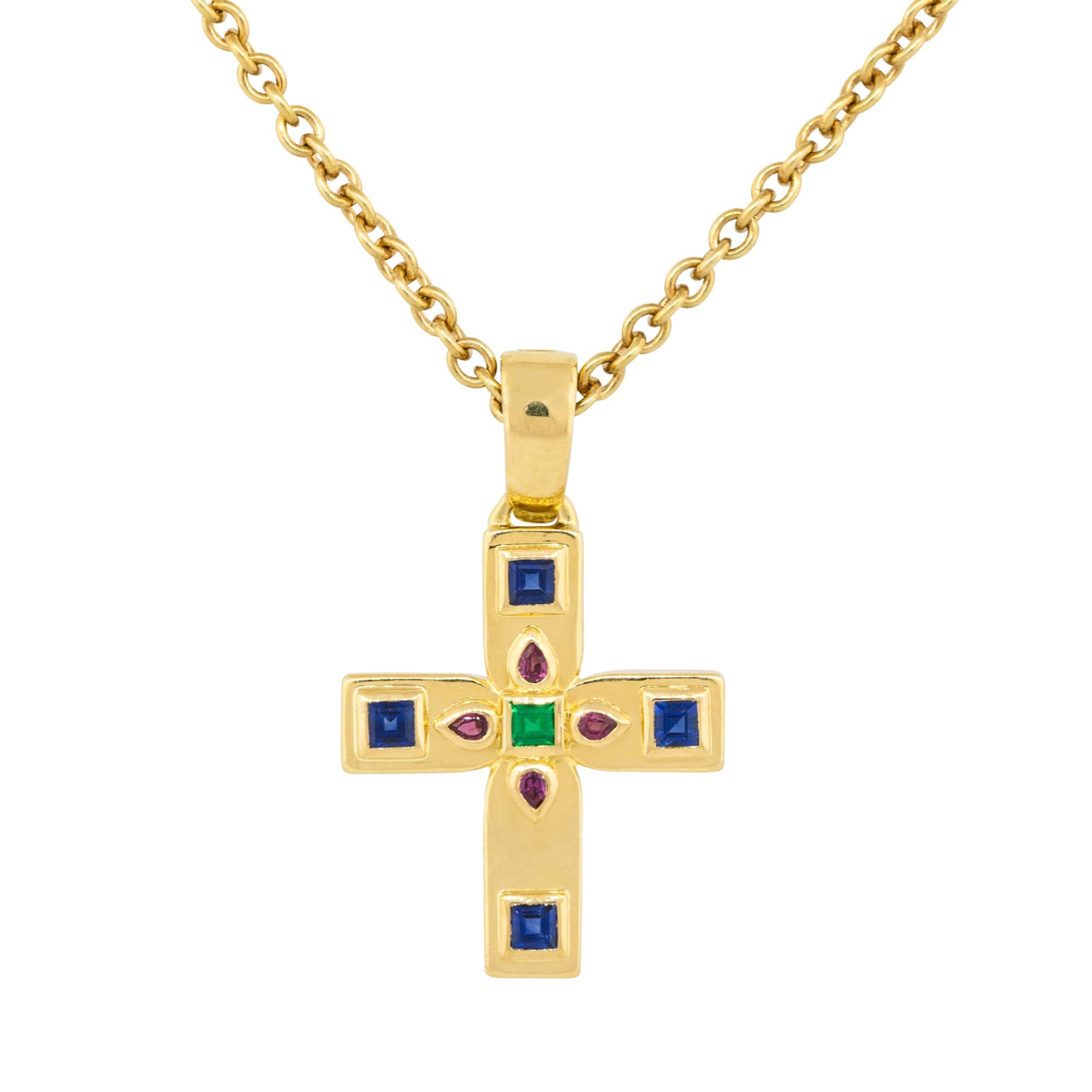 Cartier 18 Karat Yellow Gold Vizantija Diamond & Ruby Pendant Cross Necklace

This exquisite necklace features a beautifully crafted cross adorned with sapphires, emeralds, and rubies, each adding a unique touch of luxury and brilliance. The rich 18