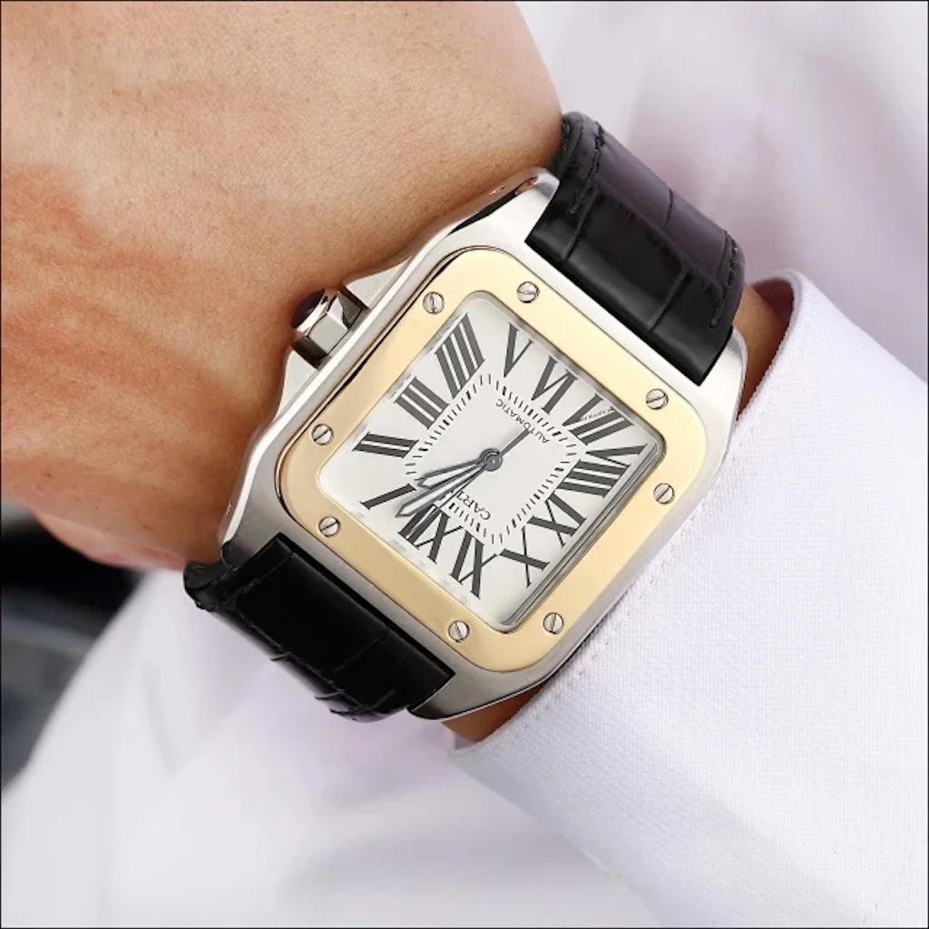 In superb condition, this Santos 100 XL sports the famous solid 18ct yellow gold bezel with signature Santos screws that frames the Roman dial perfectly. Fitted to a black alligator strap with folding clasp, this large size Santos is water-proof to