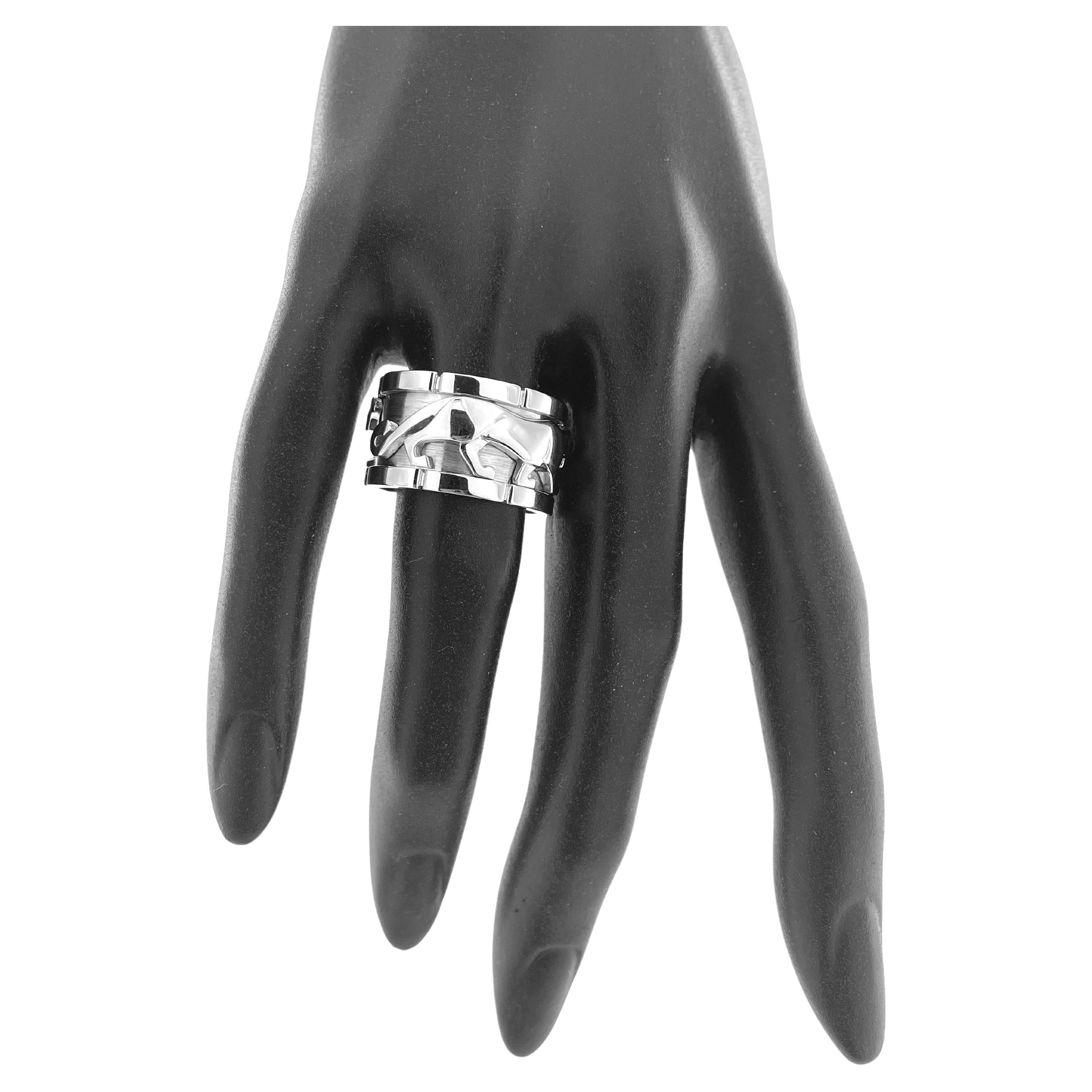 Cartier Walking Panthere Mahango Band Ring White Gold is an exquisite piece of jewelry known for its elegant and sophisticated design. Crafted from high-quality 18 kt white gold, this ring features a captivating panther motif in a dynamic walking