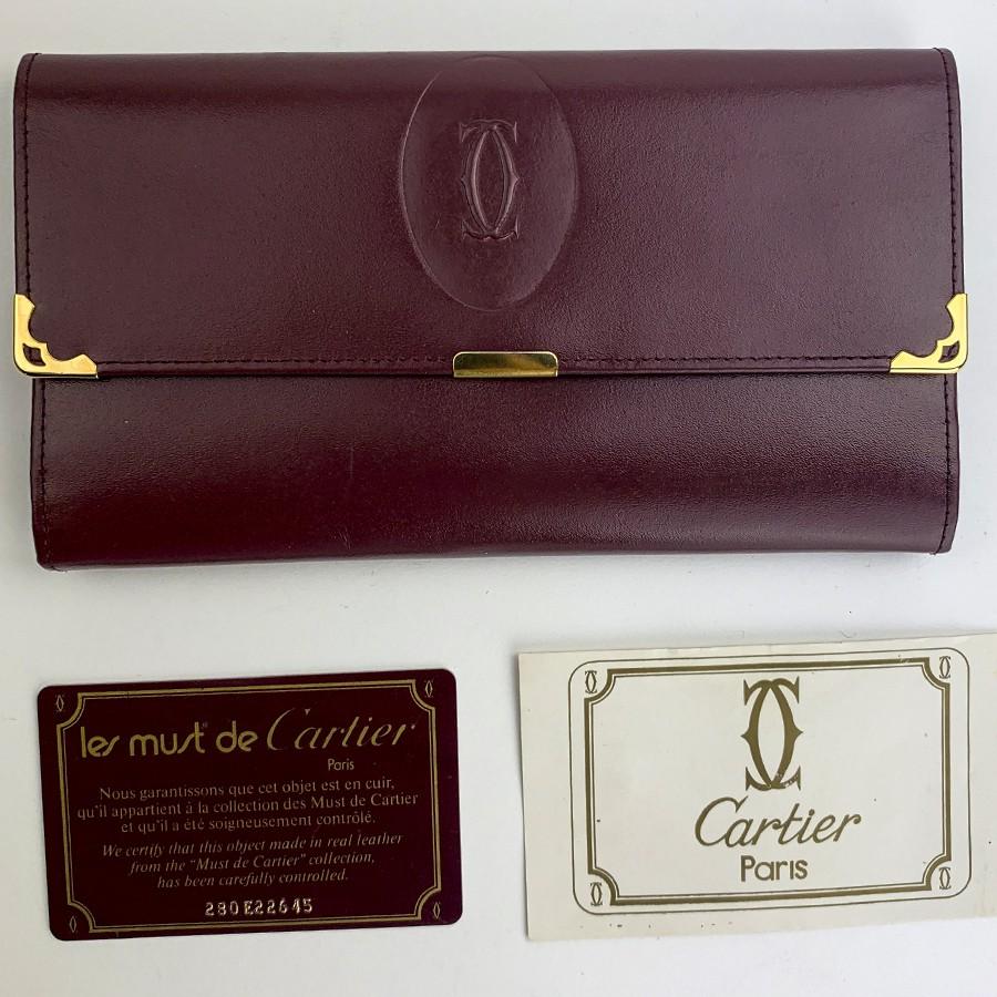 fake cartier leather goods