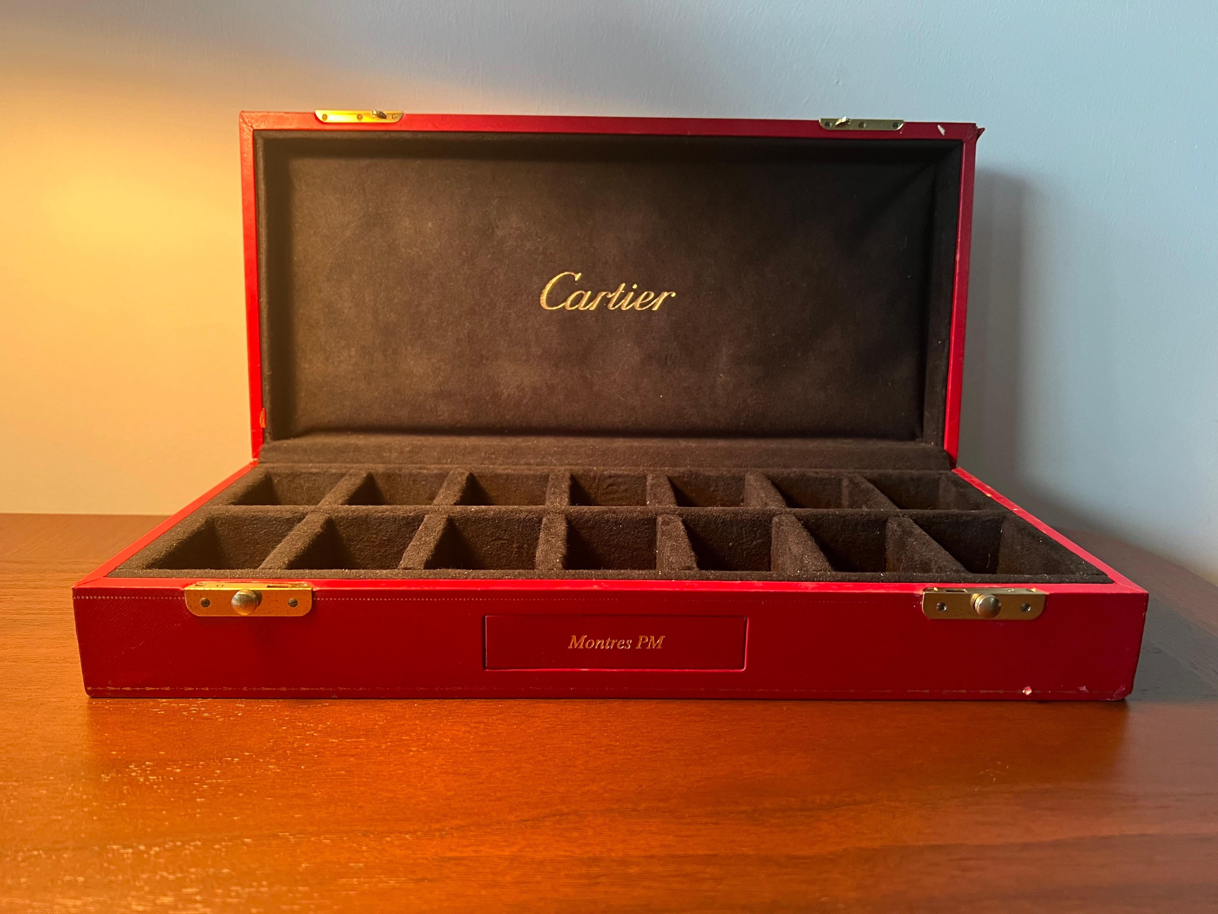 Unusual and hard to find a Cartier store watch display box. Holds 14 watches. Perfect for a Cartier watch collection!