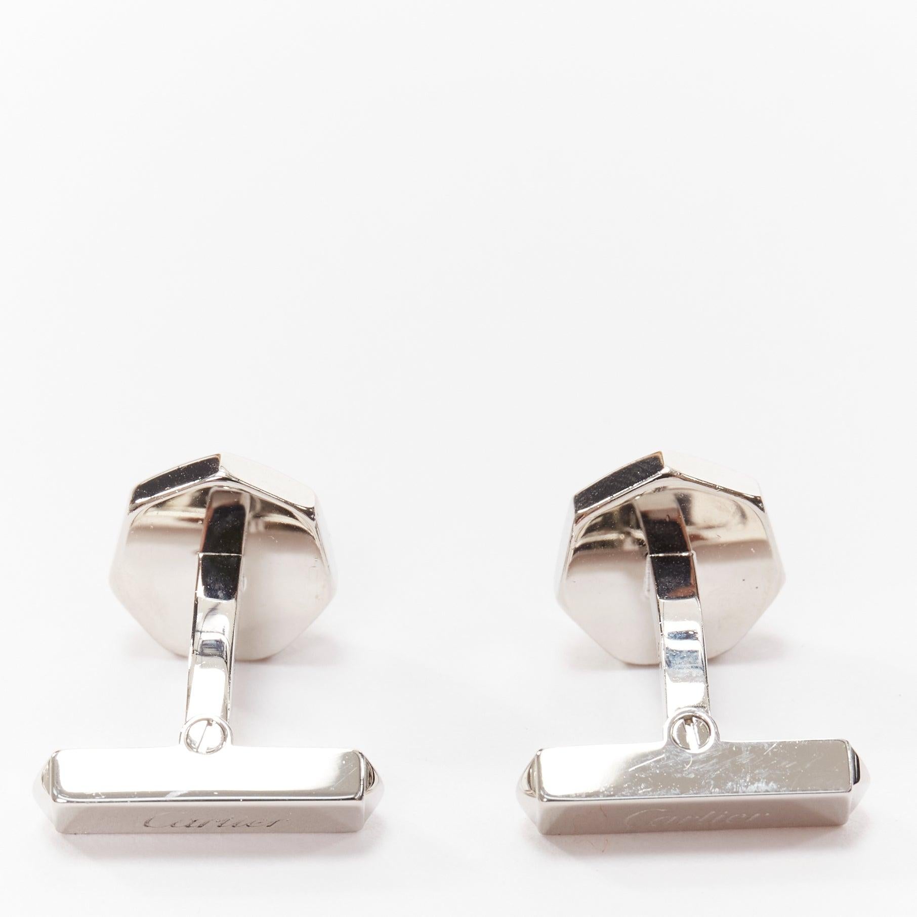 CARTIER Watch Crown Decor 925 sterling silver blue stone cufflinks
Reference: YIKK/A00047
Brand: Cartier
Material: Metal
Color: Silver, Blue
Pattern: Solid
Closure: Clip On
Lining: Silver Metal
Extra Details: Watch Crown Decor Cufflinks. Sterling