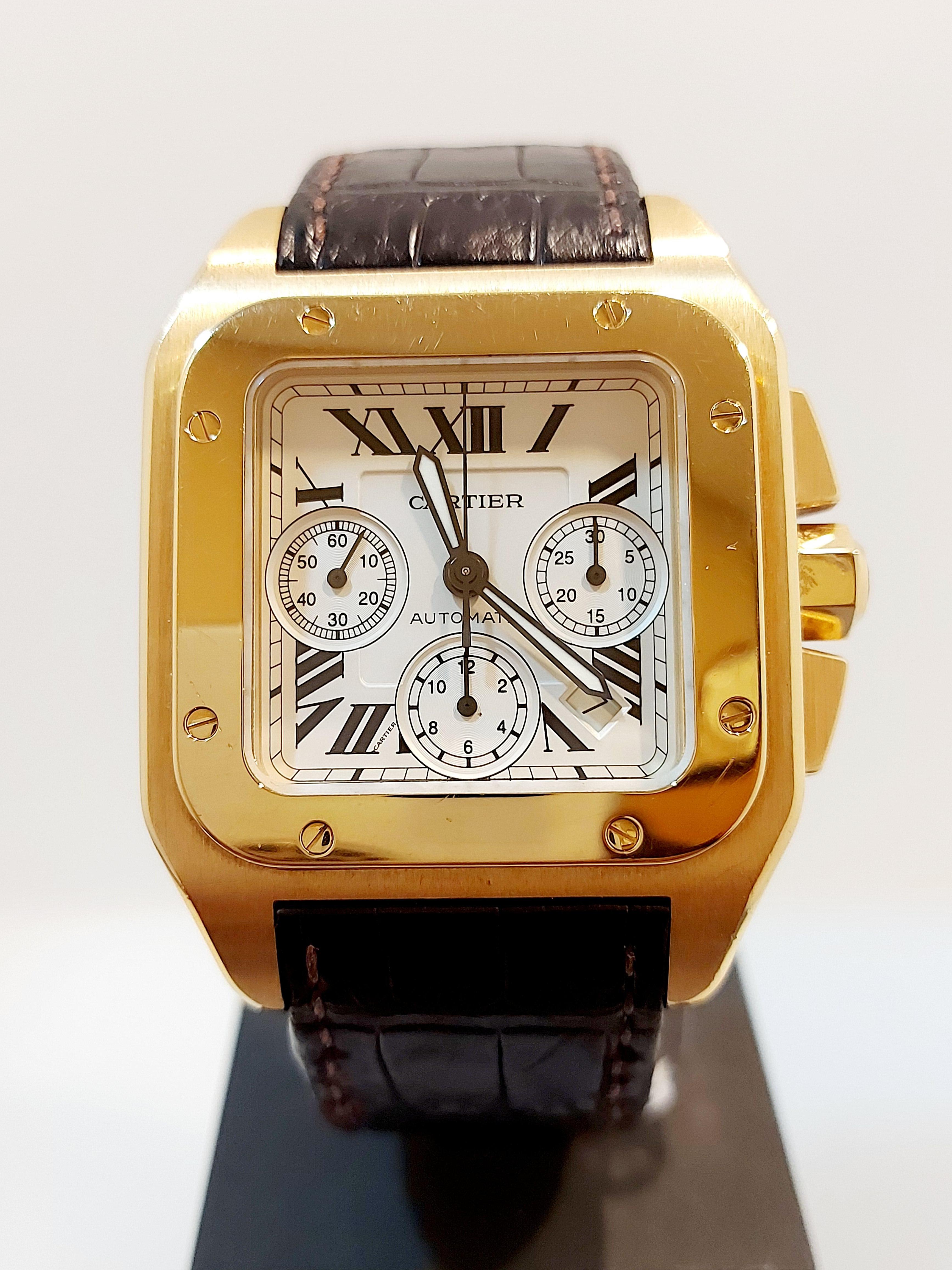 Cartier Santos 100 XL automatic watch 18ct gold with chronograph and date on a brown croc strap with an 18ct duployment 
buckle, model number W20096Y1. Original box and papers dated January 2006.