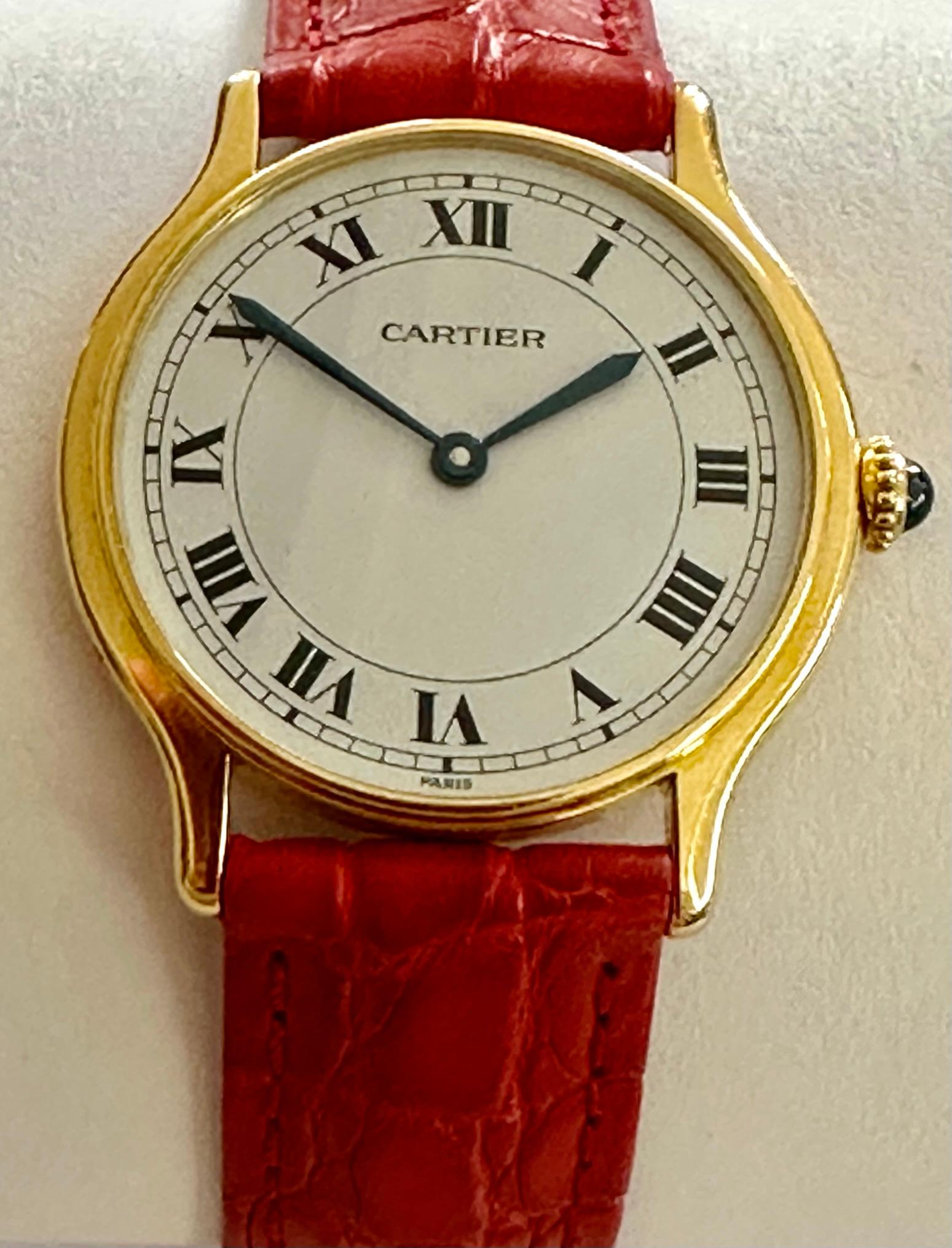 One (1) 18K. yellow gold watch with leather strap. brand: CARTIER
Model Name : Round. ( this is the large model there is also a small model made)
made between 1979 and 1984 model no: 10713.
Individual no: 1200.
Diameter: 30mm. Thickness: