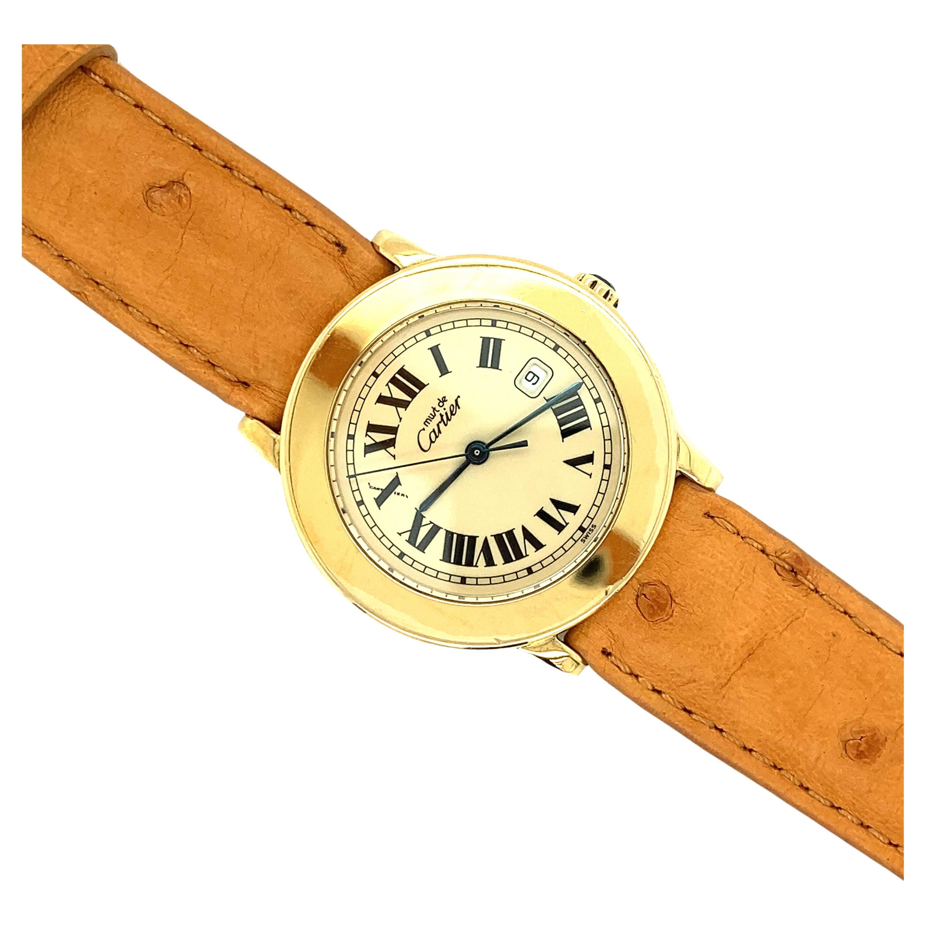 Cartier Uhr
Unisex
Sterling-Silber mit Goldplattierung
Neues echtes Straußenband
Guter Zustand