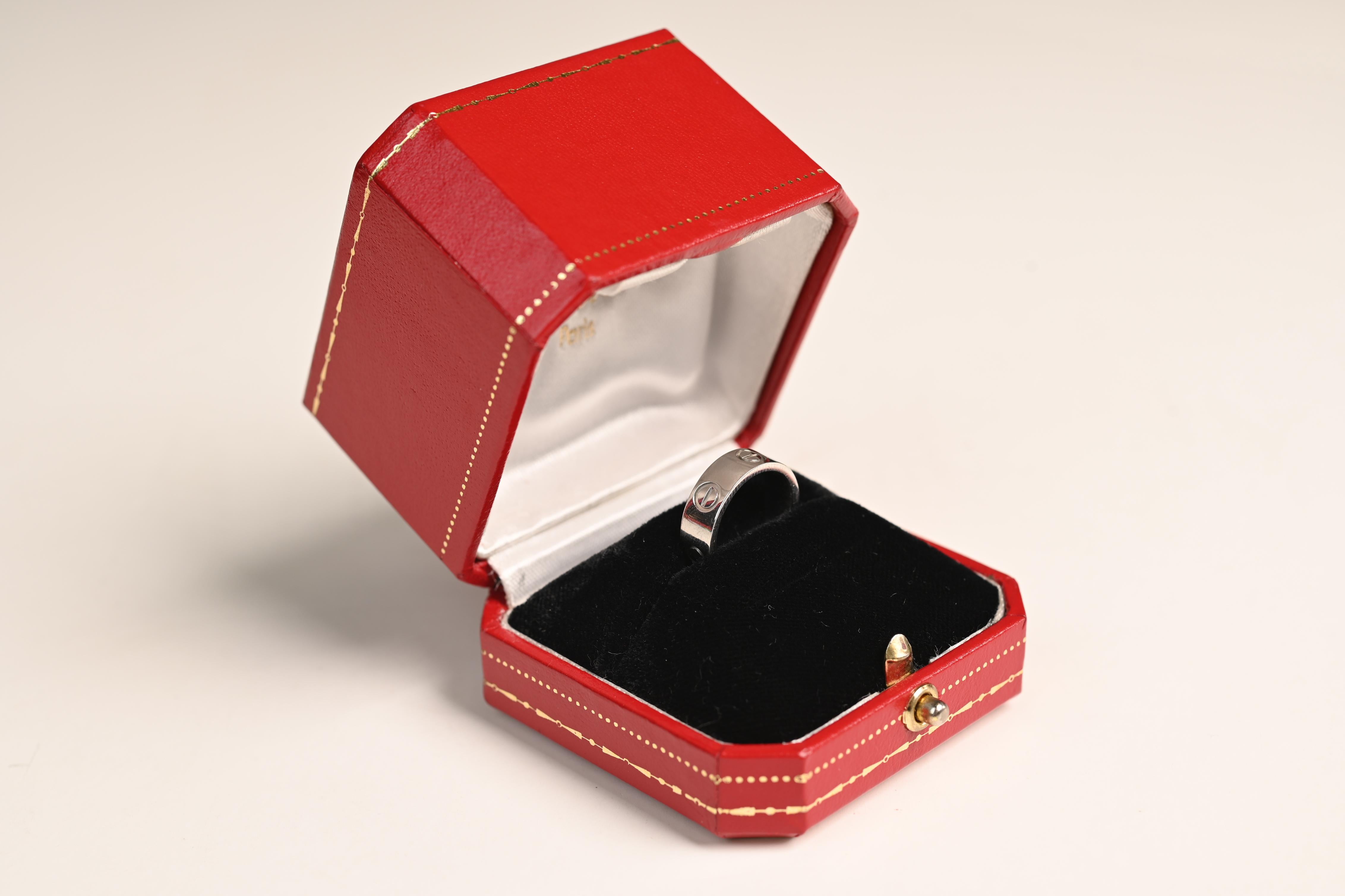 Discover timeless elegance with this exquisite Cartier Love Band, masterfully crafted in luxurious platinum. A symbol of enduring commitment and refined style, the Love Band is one of Cartier’s most iconic creations, beloved for its minimalist