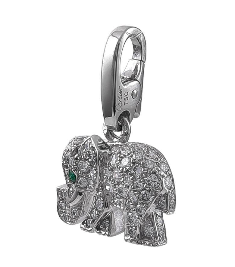 Brillanter Charme: ein figürlicher „Elefant“ mit Diamanten besetzt:: mit einem facettierten Smaragdauge.  Hergestellt:: signiert und nummeriert von CARTIER. 18 Karat Weißgold.  1