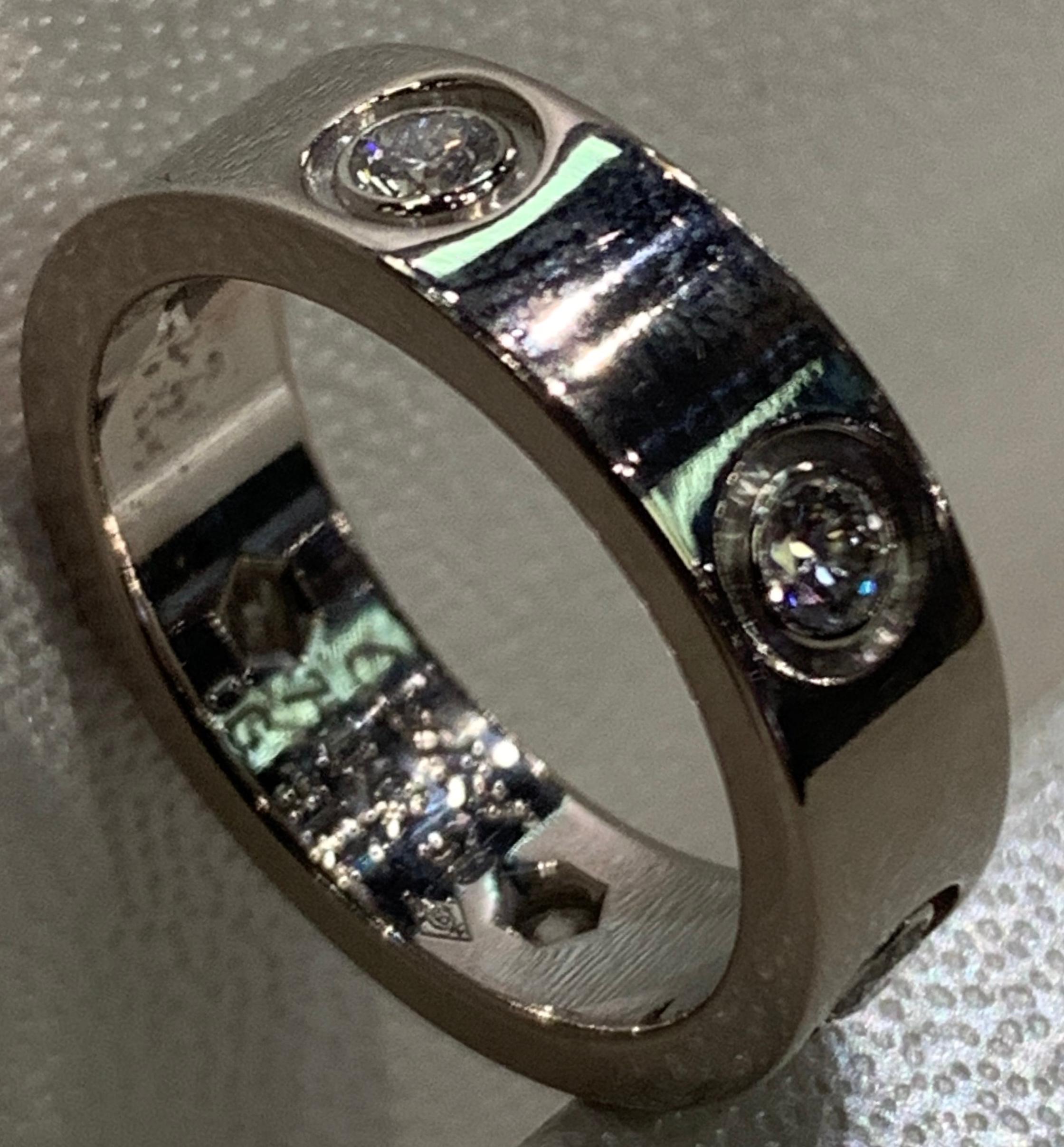 CARTIER 18K white gold LOVE ring, with six faceted diamonds. No longer made with six diamonds. Size 50 (5 1/2).
The ring everyone wants