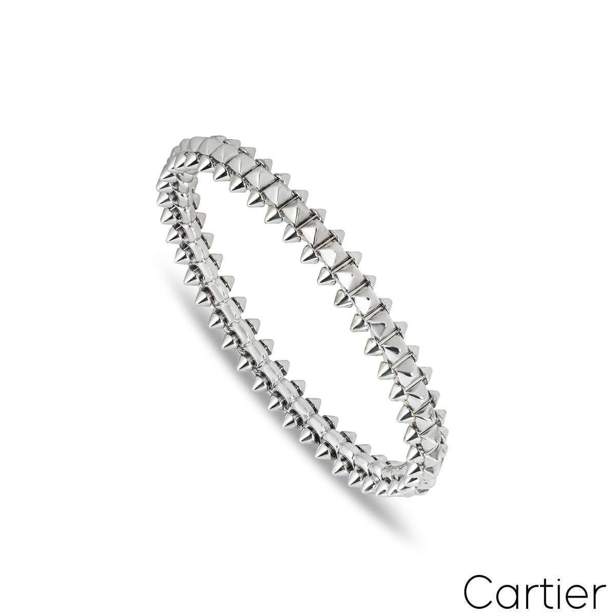 An 18k white gold bracelet from Cartier's Clash de Cartier collection. The bracelets design is composed of a studded style centre which is complemented by by smaller studs all the way round. The clasp operates with a simple lift and push system on