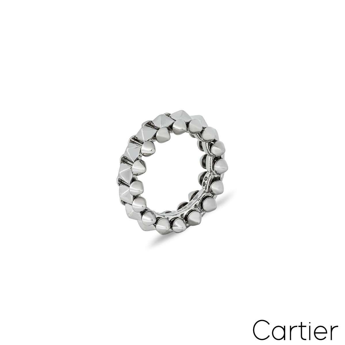 An 18k white gold ring from Cartier's Clash de Cartier collection. The rings design is composed of a studded style centre band which is complemented by smaller studs all the way round. Weighing 11.1 grams, the ring is a UK size K½/ US size 5 1/4/ EU