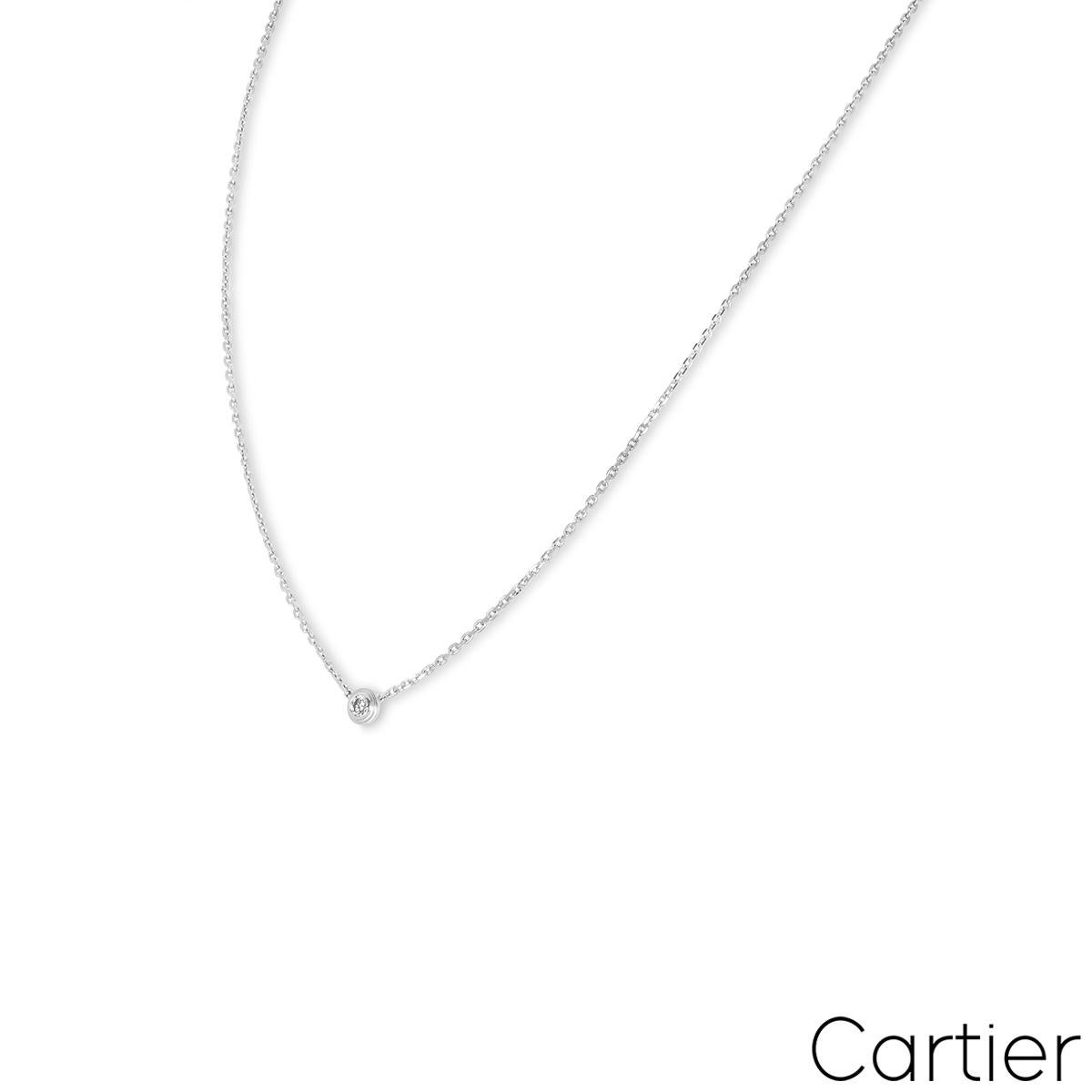 A charming 18k white gold diamond pendant by Cartier from the D'Amour collection. The necklace is adorned with a single round brilliant cut diamond in a bezel setting weighing approximately 0.04ct, F colour and VS clarity. The adjustable XS necklace