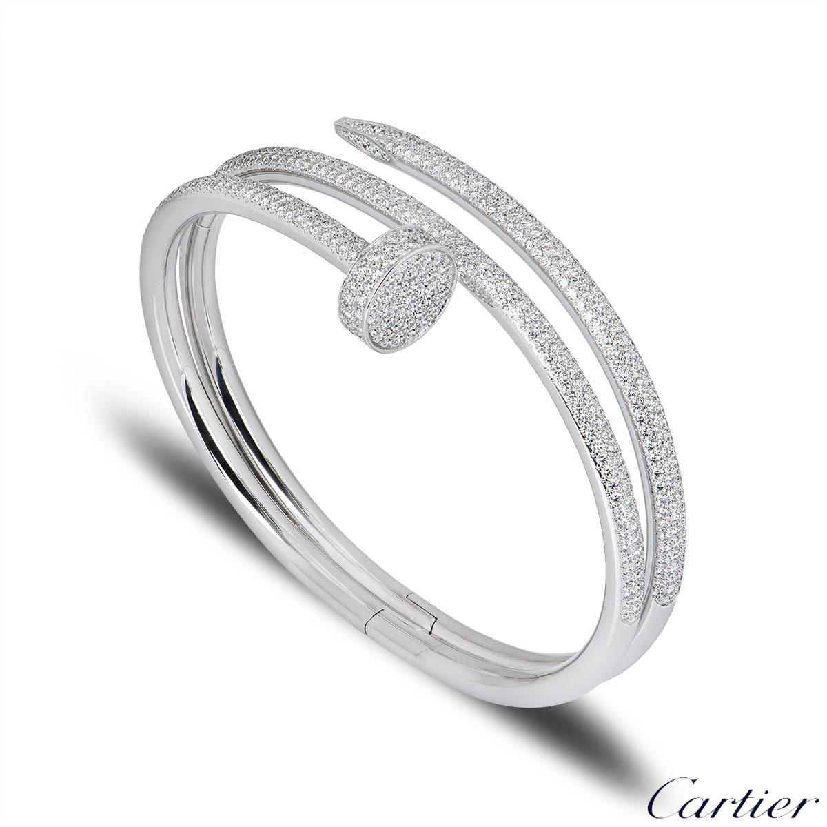 A stunning 18k white gold diamond bracelet by Cartier from the Juste Un Clou collection. The bracelet is of a nail design, fully pave set around the outer side with 624 round brilliant cut diamonds totalling 3.61ct. The bracelet measures 2cm at the