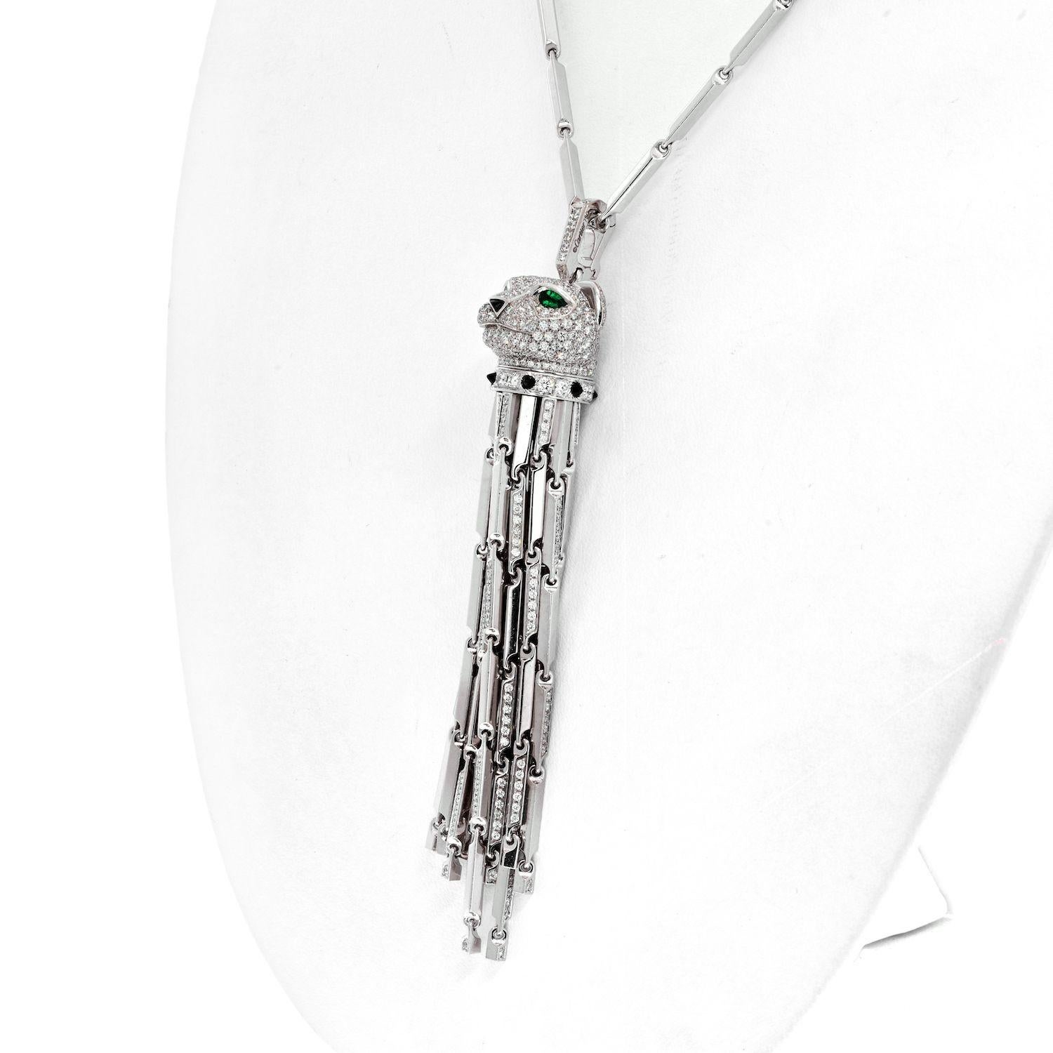 The Cartier Panthere tassel pendant with black enamel, black onyx, and set with round diamonds is a stunning piece of jewelry. The F/G color and VVS-VS clarity of the diamonds ensure that the pendant sparkles and catches the eye. The pear-shaped