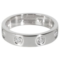 Bague Love en or blanc à diamants et petit modèle de Cartier