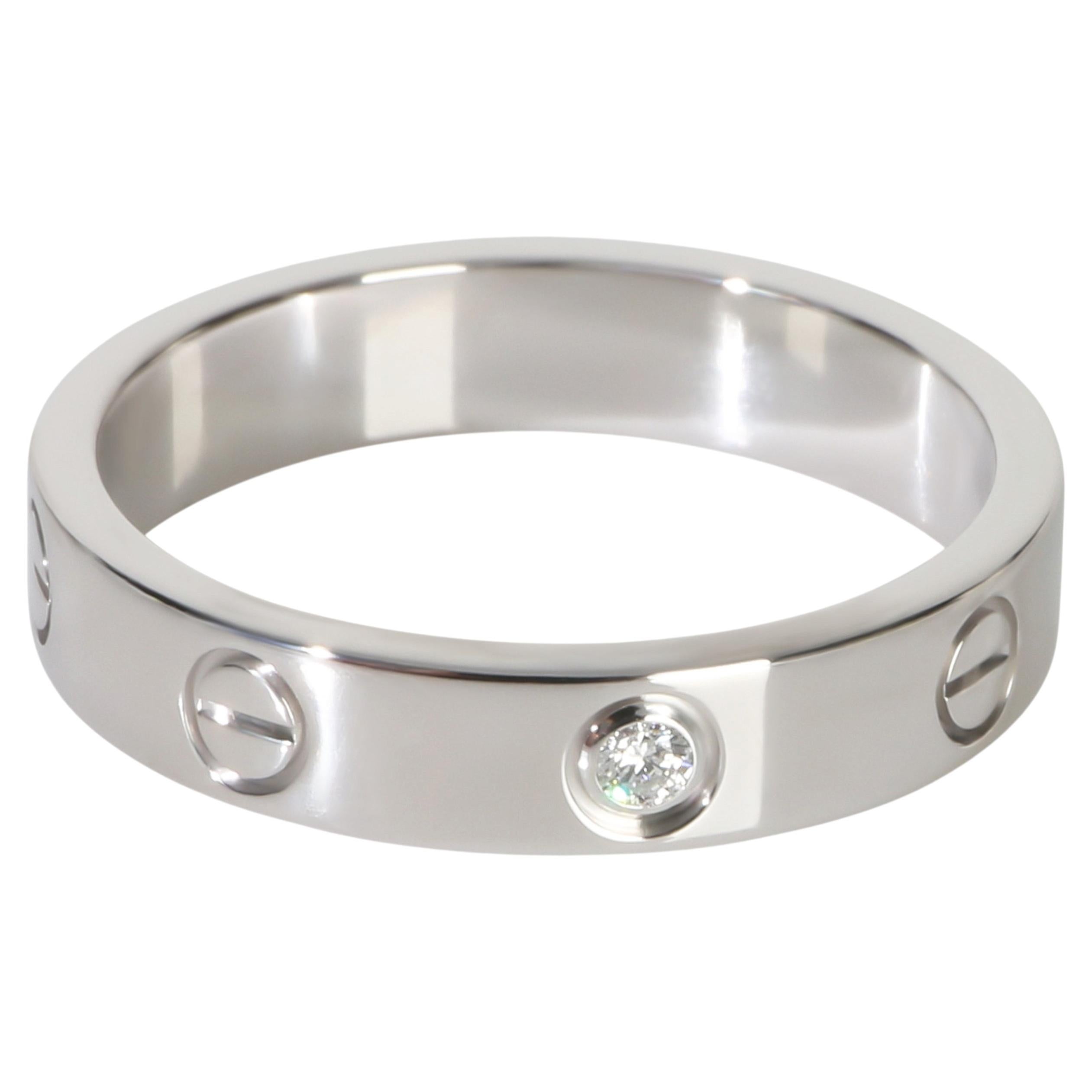 Bague Love en or blanc à diamants et petit modèle de Cartier