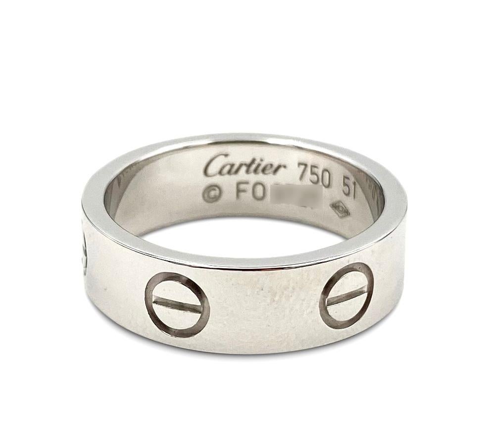 Authentic Cartier Love ring crafted in 18 karat white gold.  Signed Cartier, 51, Au750, with serial number and hallmarks.  Size 51, US size 5 3/4.  Comes with Cartier box, no papers.  CIRCA 2010s