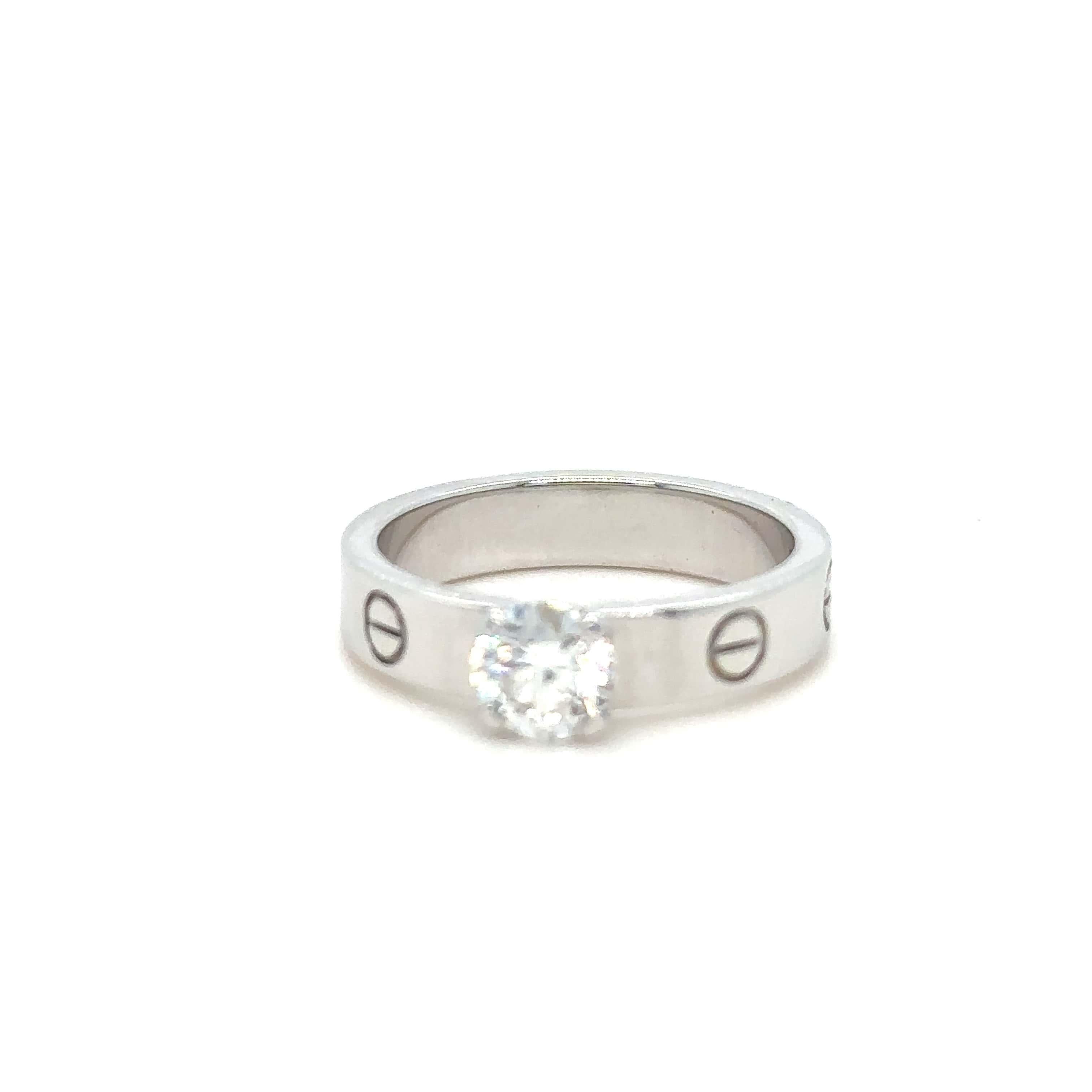 Unique features: 

Cartier Love Solitaire Ring, white gold 750/1000, set with a brilliant-cut diamond. Width: 4 mm. Thickness 1.6 mm.

Metal: White Gold 750/1000
Carat: 0.60ct
Colour: N/A
Clarity:  N/A
Cut: N/A
Weight: N/A
Engravings/Markings: