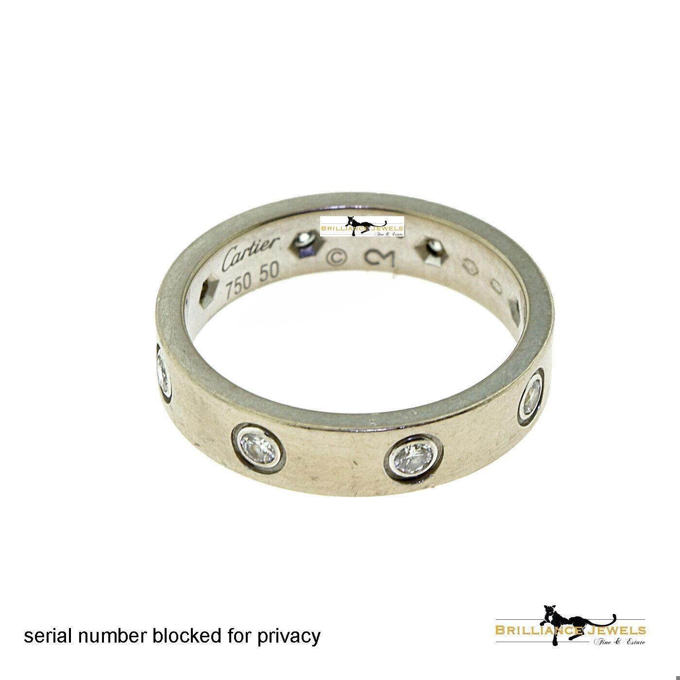 ITEM SPECIFICATIONS:
Brand: Cartier
Collection: LOVE
Metal: White Gold
Metal Purity: 18k
Stone: 8 Brilliant Round Cut Diamonds
Total Carat Weight: 0.19 carats
Ring Size: 50 (euro) ; 5.25 (US)
Total Item Weight (grams): 4.7
Hallmark: Serial Number,