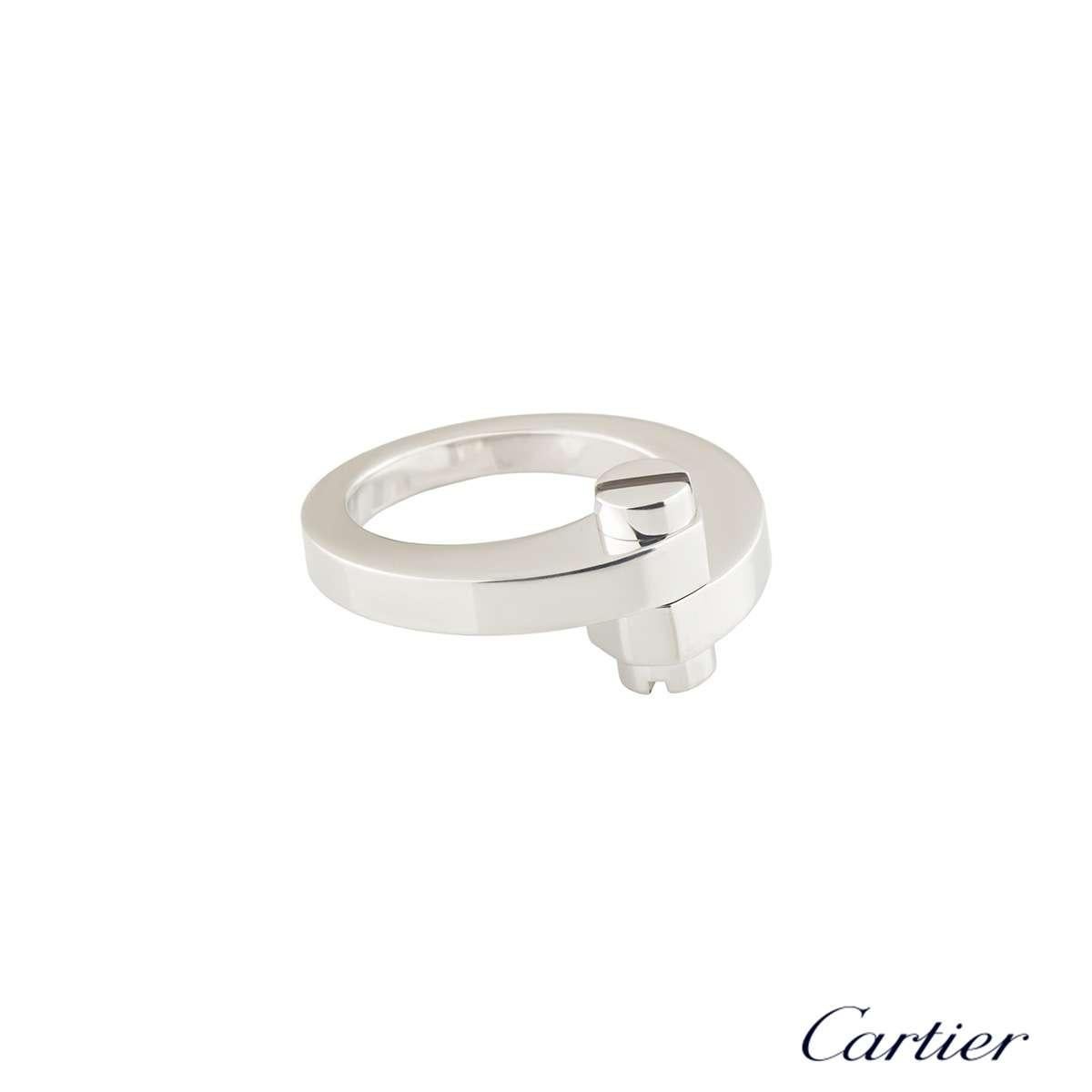 A trendy 18k white gold Cartier ring from the Menotte collection. The ring comprises of the iconic motif with two screw motif terminations. The ring is a size UK O/US 7/EU 55 and has a gross weight of 15.60 grams.

The ring comes complete with a