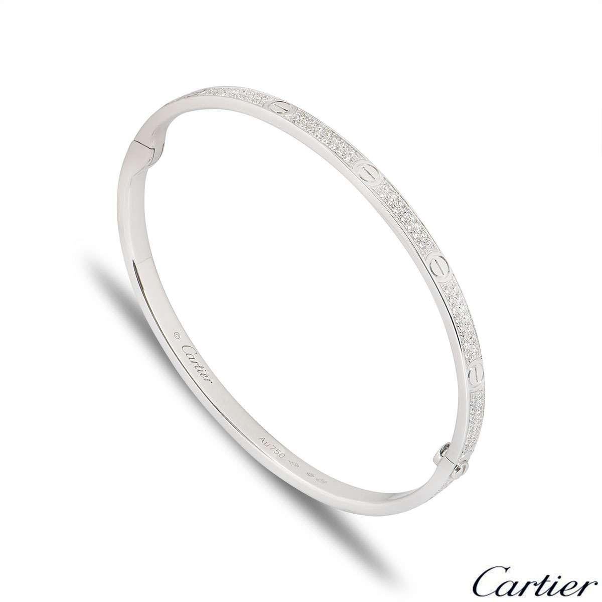 A sparkly 18k white gold diamond Cartier bracelet from the Love collection. The bracelet comprises of the iconic screw motifs around the outer edge complemented with 177 round brilliant cut pave set diamonds in between. The diamonds have a total