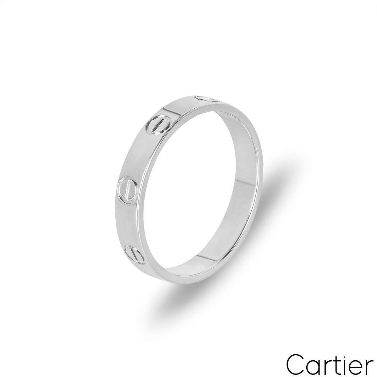 An 18k white gold Cartier wedding band from the Love collection. The ring comprises of the iconic screw motifs and is a size UK R½ - EU 59. Measuring 3.6mm in width with a gross weight of 3.29 grams.

Comes complete with a RichDiamonds presentation