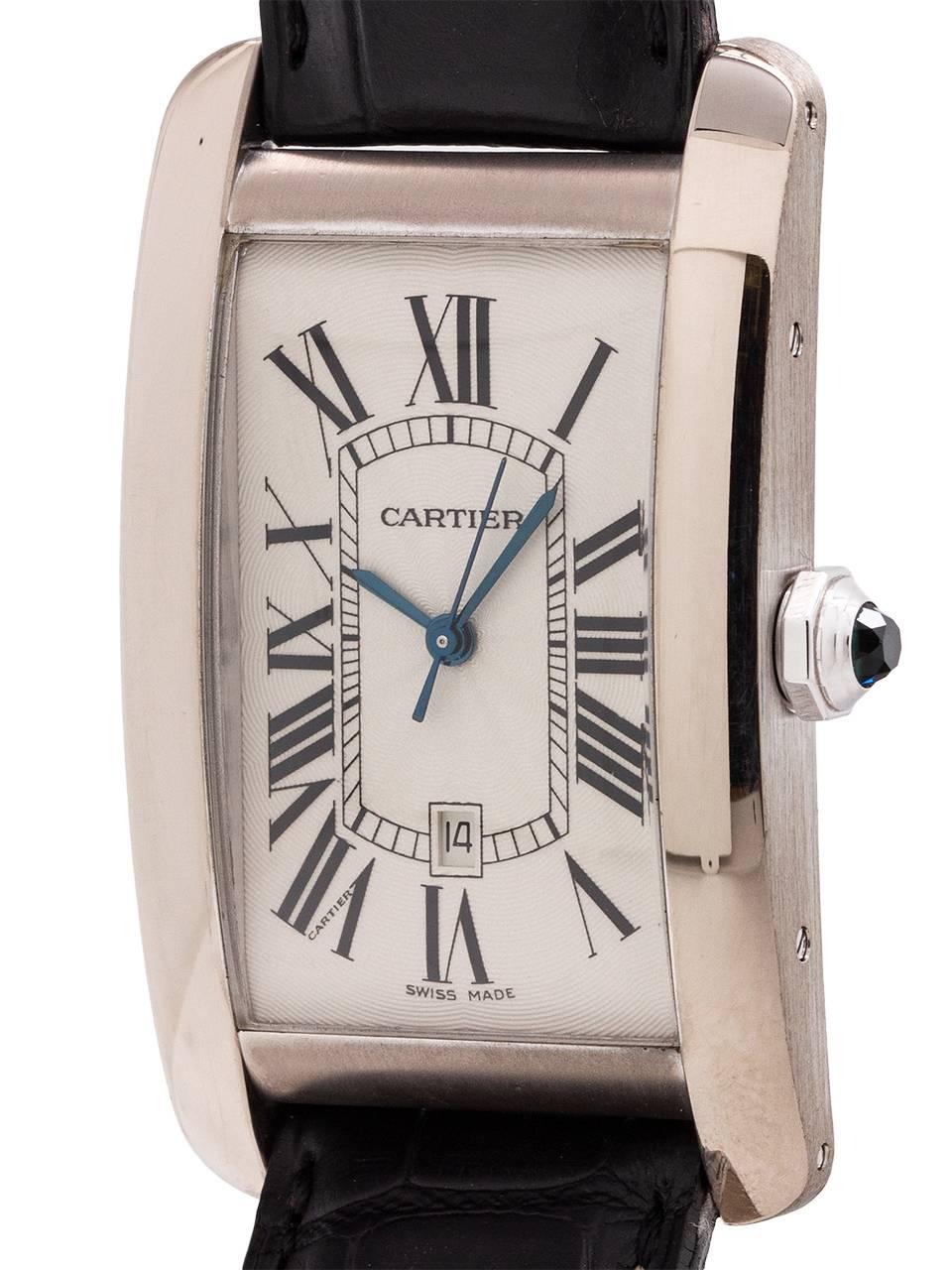 
Large man’s Cartier 18K WG Tank American,  XL case, circa 2000’s. Featuring classic curvex style oversized 27 X 45mm case secured by 8 side and caseback screws. With classic silvered dial with Roman figures including Cartier “secret” signature and