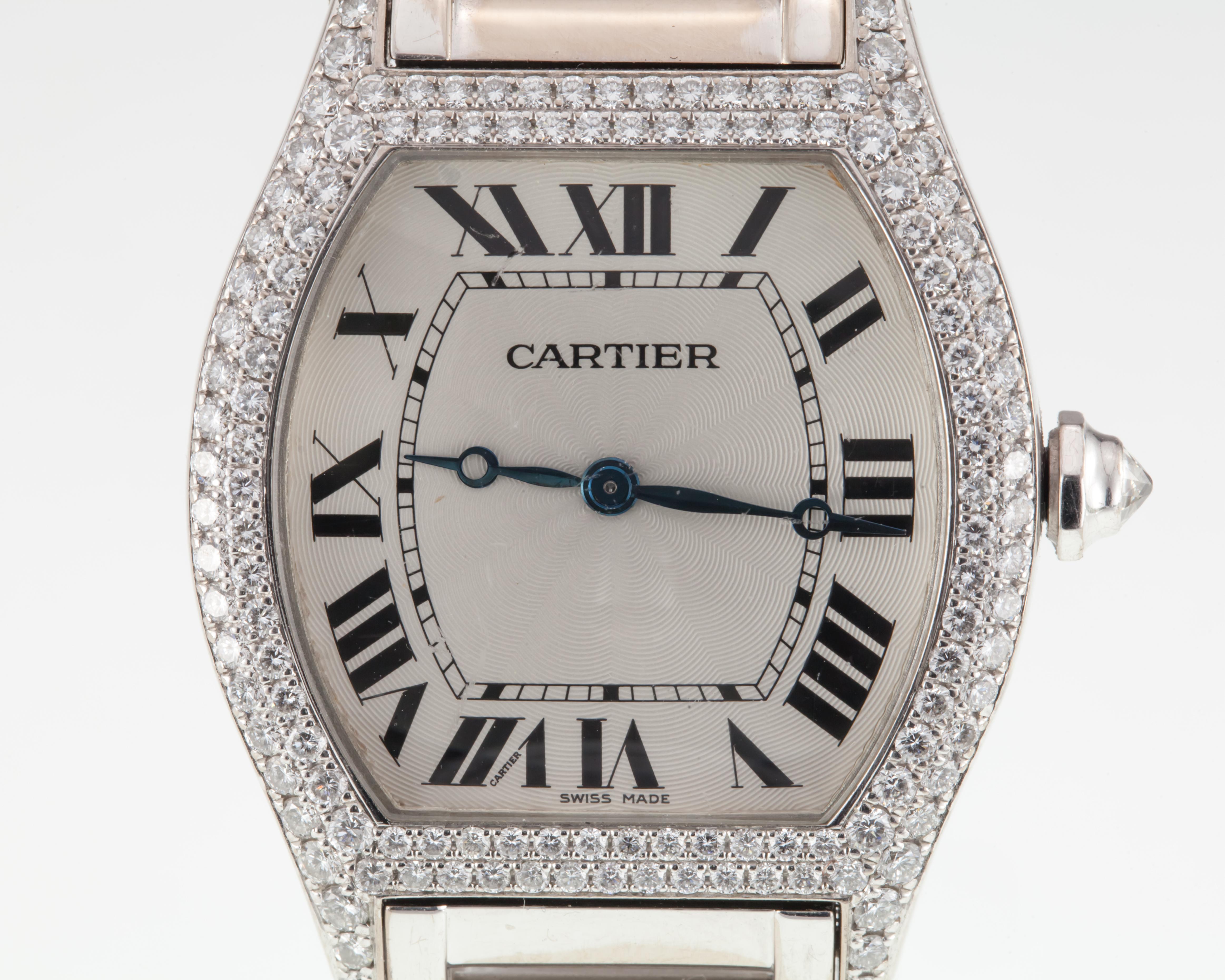 Model #2497
Movement #430 MC
18k White Gold Tonneau Case
NOTE: Very minor scratches on sapphire crystal.
Features Factory Collection Quality Diamonds All around Bezel and Lugs
Case Width = 33 mm (37 mm w/ Diamond Culet Crown)
Case Length = 33