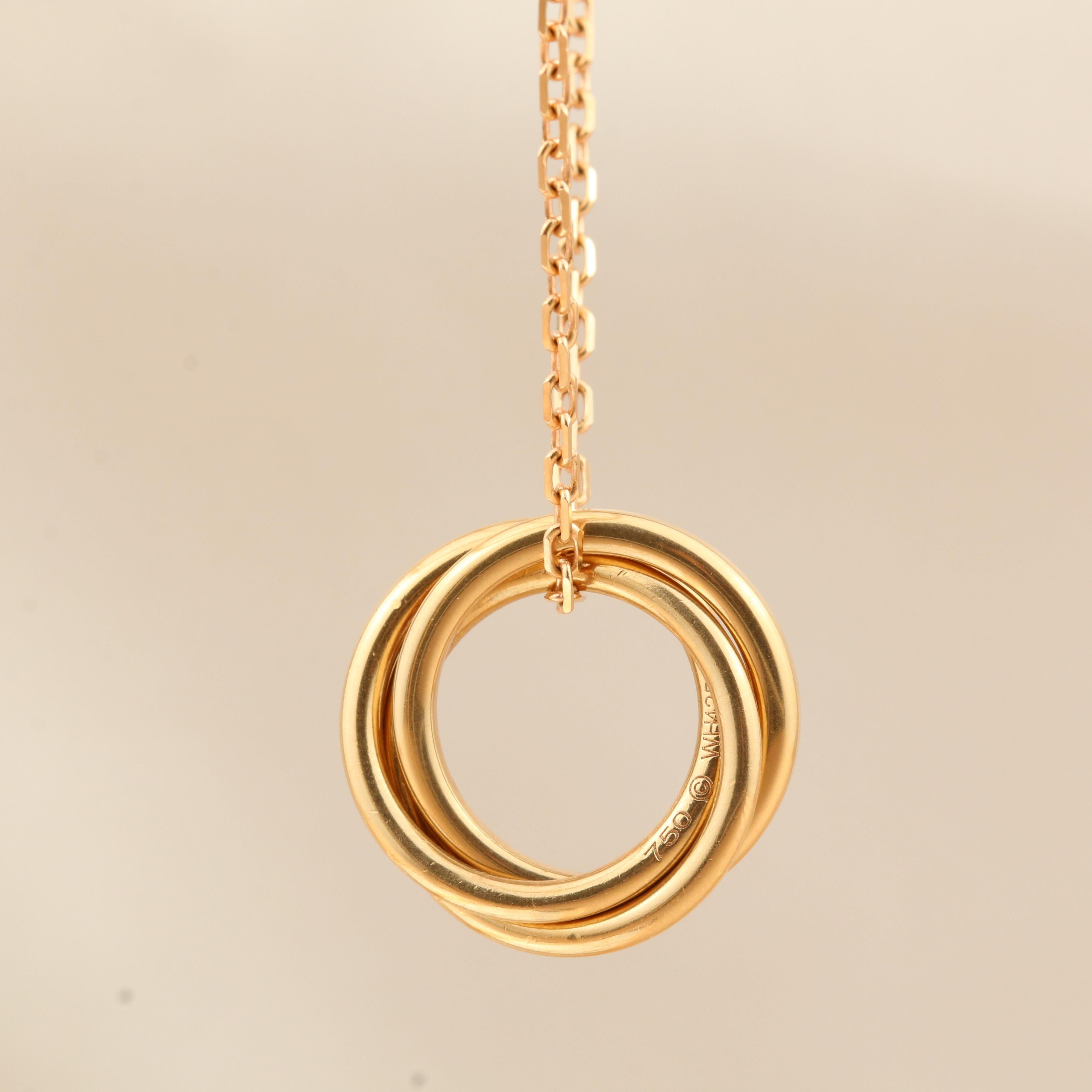 Women's or Men's Cartier White, Yellow, Rose Gold and Pink Sapphire Trinity Pendant Necklace