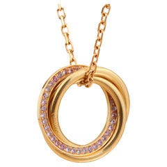 Cartier White, Yellow, Rose Gold and Pink Sapphire Trinity Pendant Necklace