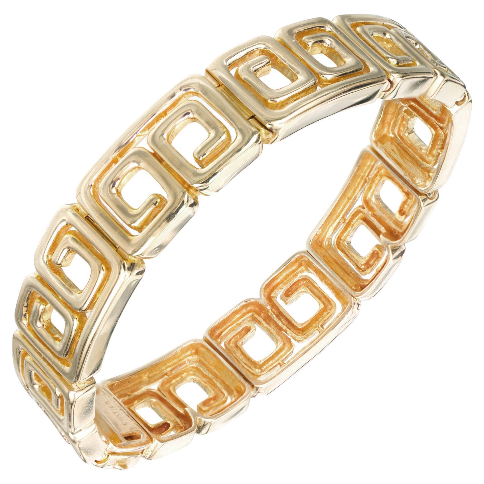 Hard to find 1970's 14k yellow gold double C bracelet. Fits up to 7.5 wrist.  Made by Whiteside & Blank for Cartier in 14k solid gold. Whiteside & Blank is a US company that has made jewelry and watches for Cartier since the early 1900's. During the