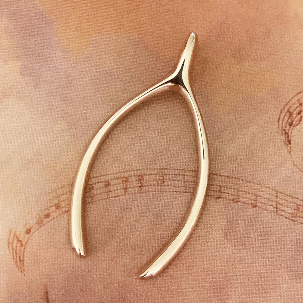 Cartier Wish Bone Gold Charm In Excellent Condition In New York, NY