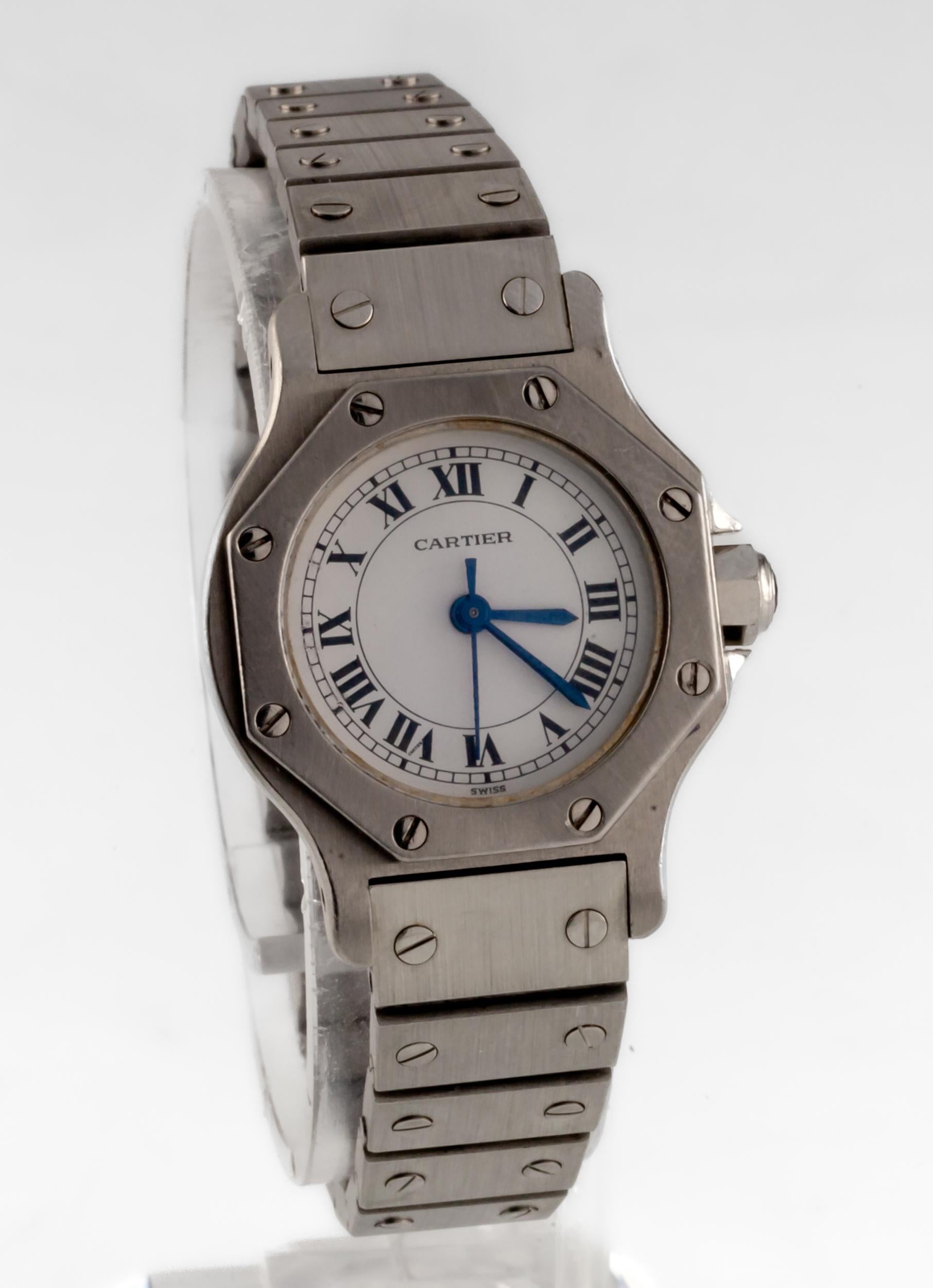 Cartier Women's Stainless Steel Round Santos Automatic Watch w/ Box and Papers
Movement #2670-ETA
Case #090605956 SS
Stainless Steel Round Case
25 mm in Diameter (27 mm w/ Spinel Crown)
Lug-to-Lug Distance = 31 mm
Lug-to-Lug Width = 12 mm
Thickness