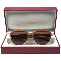 Lunettes de soleil Cartier Bois Malmaison Précieux Bois Clair et Or 54mm