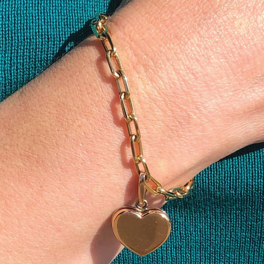 Women's Cartier Yellow and White Gold Heart Charm on Yellow Gold Chain Bracelet