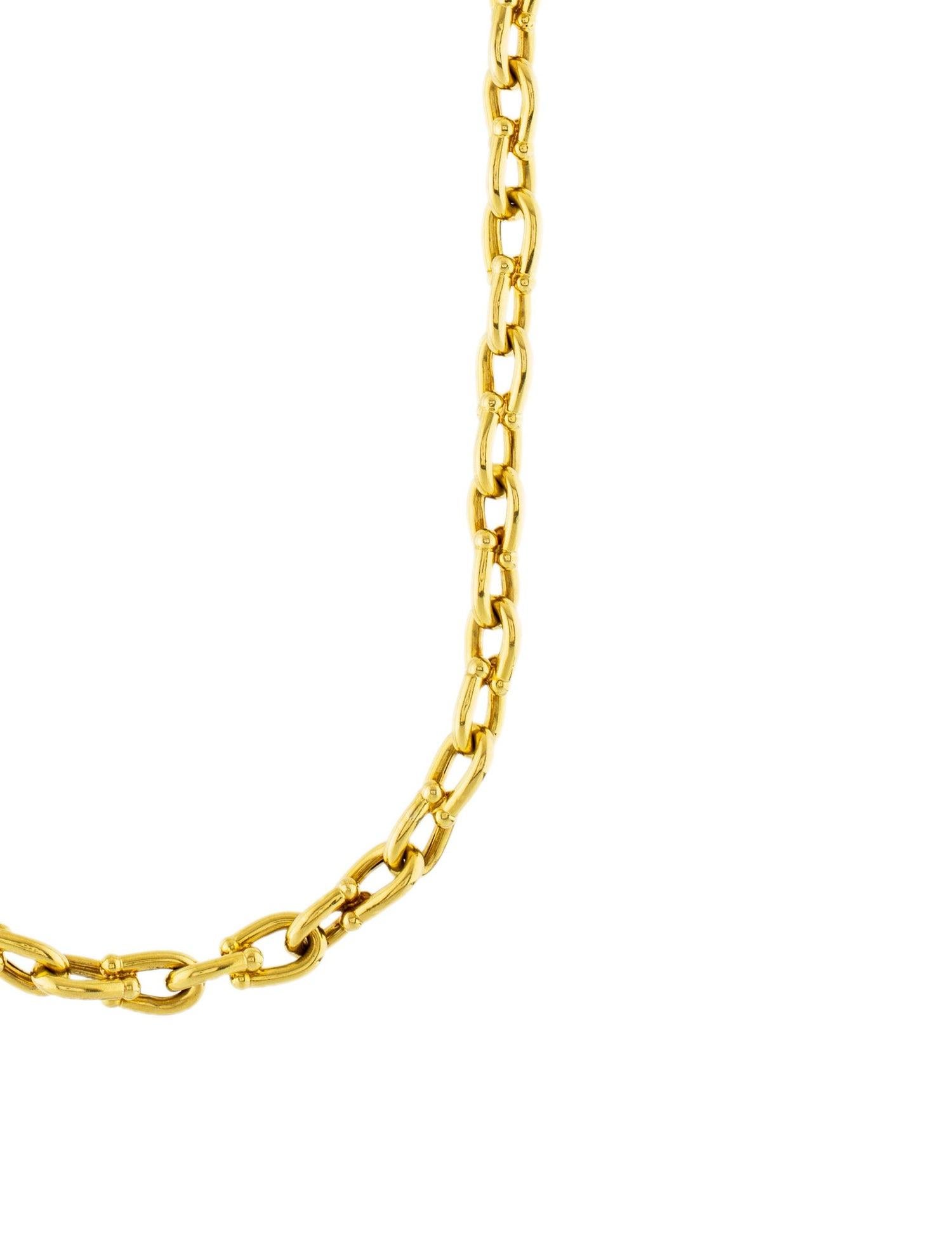 Description
18K yellow gold Cartier Horseshoe chain-link necklace featuring a high polish finish throughout and hinged clip closure.

Metal Type: 18K Yellow Gold
Hallmark: 18K, Designer Signature, Serial Number
Signature: Cartier 15****
Location: