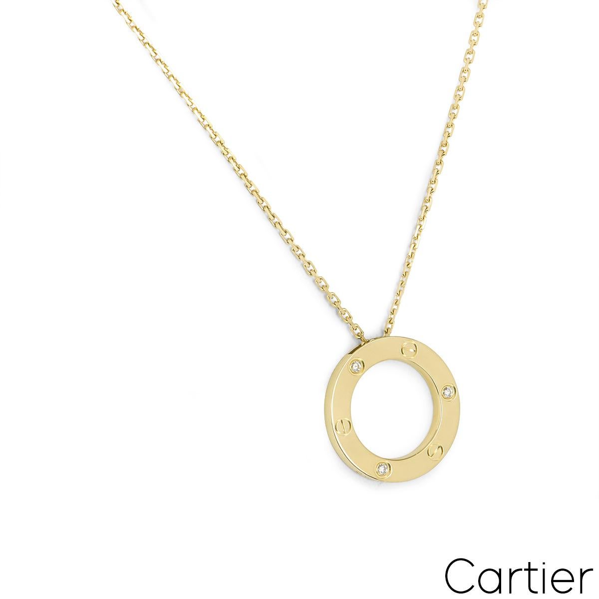 An 18k yellow gold diamond pendant by Cartier from the Love collection. The pendant is comprises of an open circular motif, set with 3 round brilliant cut diamonds totalling 0.07ct and alternating between the iconic screws. On the reverse of the