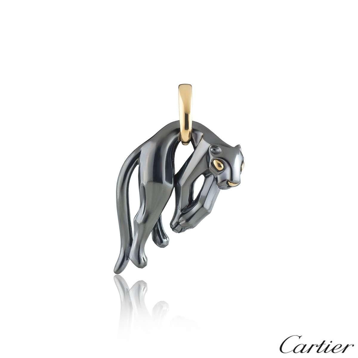 An 18k yellow gold and silverium pendant by Cartier from the Panthere De Cartier collection. The pendant comprises of a silverium panther motif hanging from the waist on a yellow gold loop bail. The motif measures 4.5cm in height and 3.2cm in width