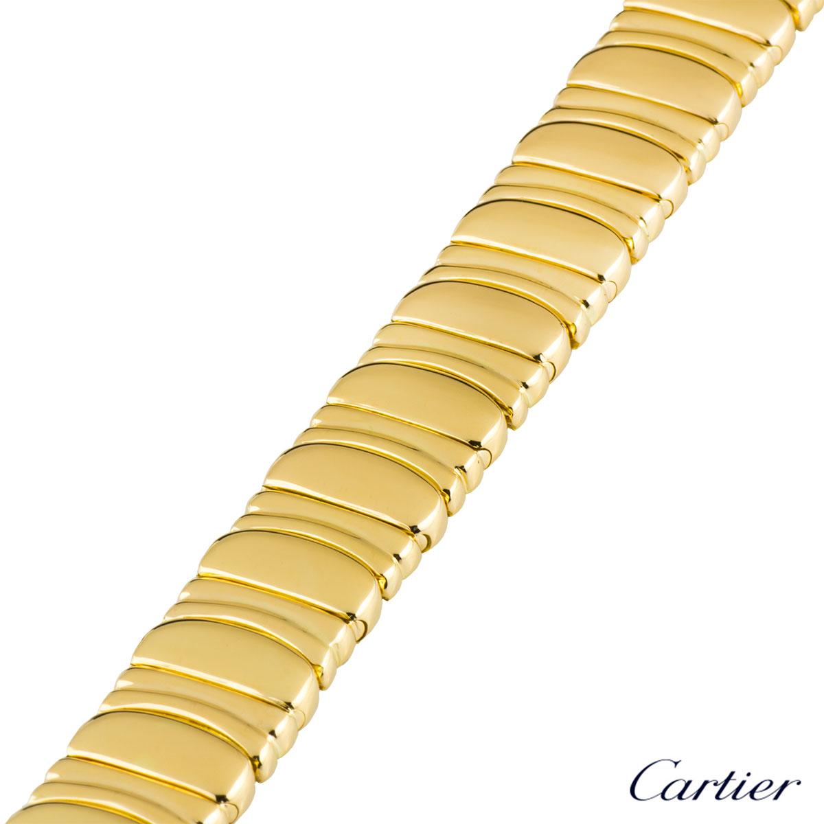 A lovely 18k yellow gold Cartier bracelet from the Baignoire collection. The bracelet comprises of the iconic baignoire C motifs with a smooth and elegant polished finish throughout. The bracelet measures 7 inches in length and 12mm in width and