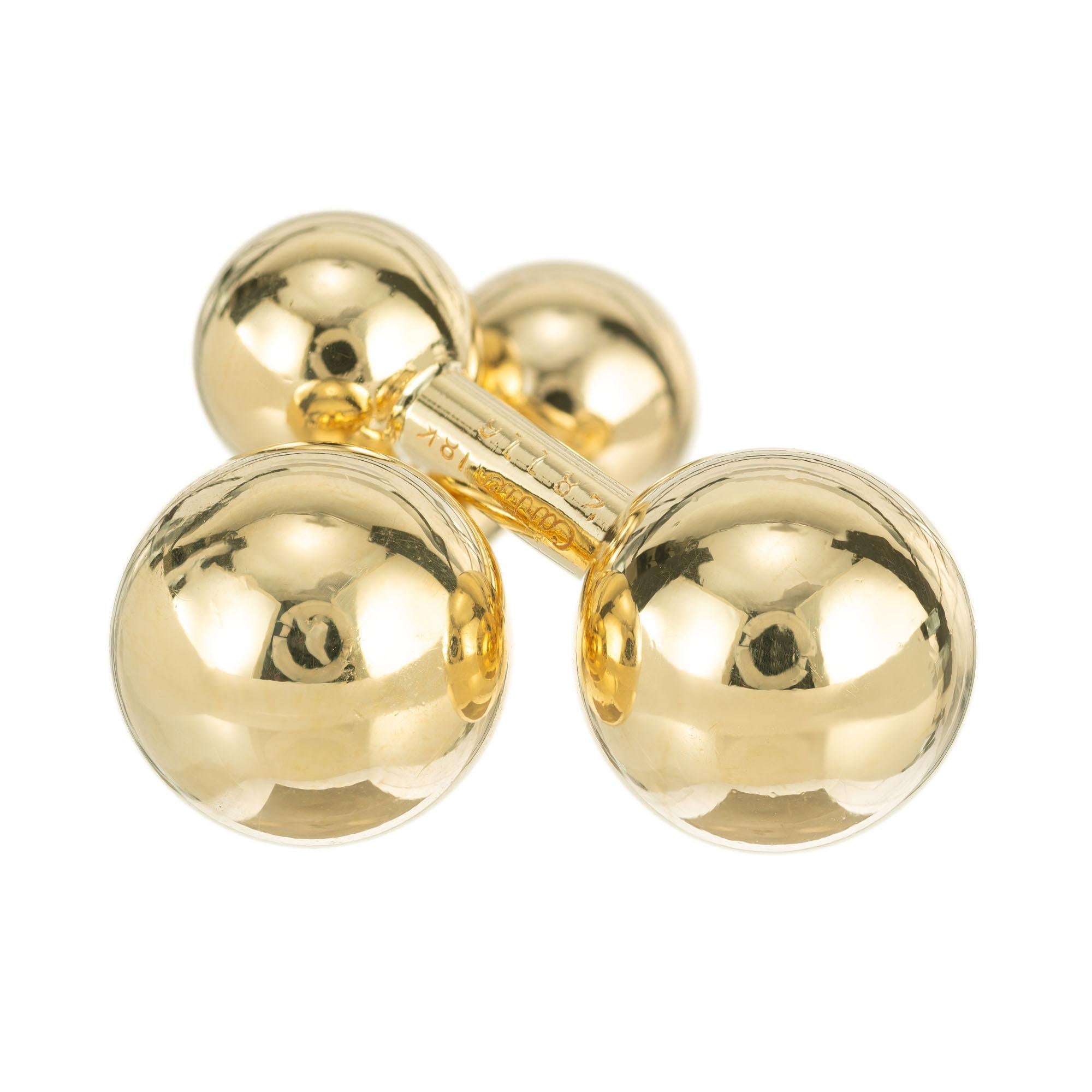 Circa 1940 Cartier 18k Yellow gold barbell double sided cufflinks.

18k yellow gold
Stamped: 18k
Hallmark: Cartier 28116
11.6 grams
Top to bottom: 12.7mm or .5 Inch
Width: 3.6mm or 1.25 Inches
Depth or thickness: 12.7mm
