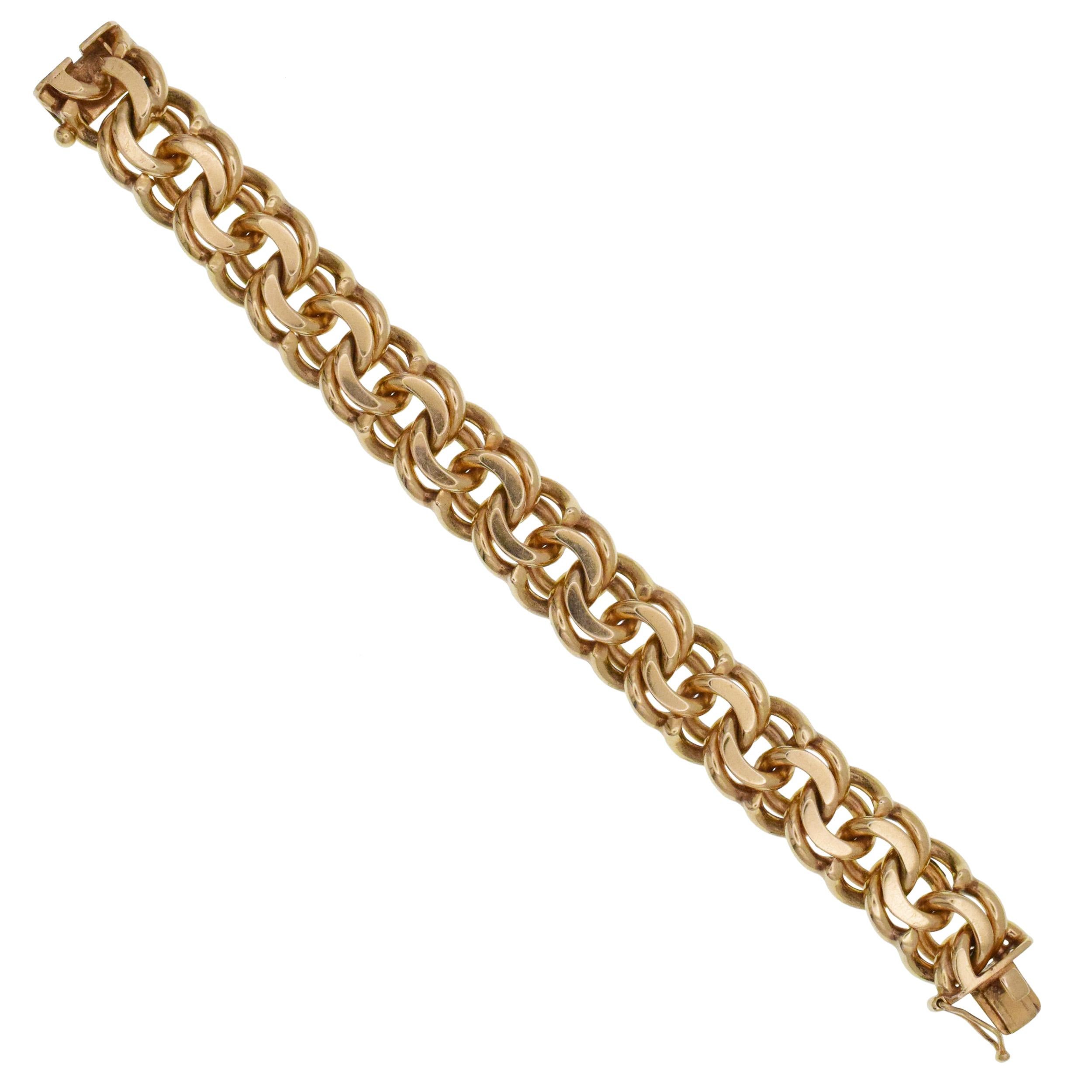 Cartier Bracciale a catena Bismark in oro giallo 14k Questo bracciale ha uno stile a catena Bismark realizzato in oro giallo 14k. 
Anni '40-'50 circa. Firmato Cartier, seriale
No.12264, 14k, Lunghezza: 8 pollici,
Larghezza: 11/16 di pollice,
Peso: