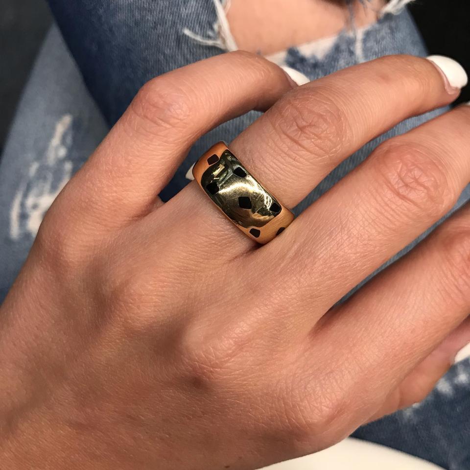 Cartier Black Lacquer 18 Karat Yellow Gold Panthere Ring. Great condition.

The Cartier panther is still looking elegant after 100 years. Ever since its 1914 debut, Cartier's iconic feline has been sought after by royalty, models and