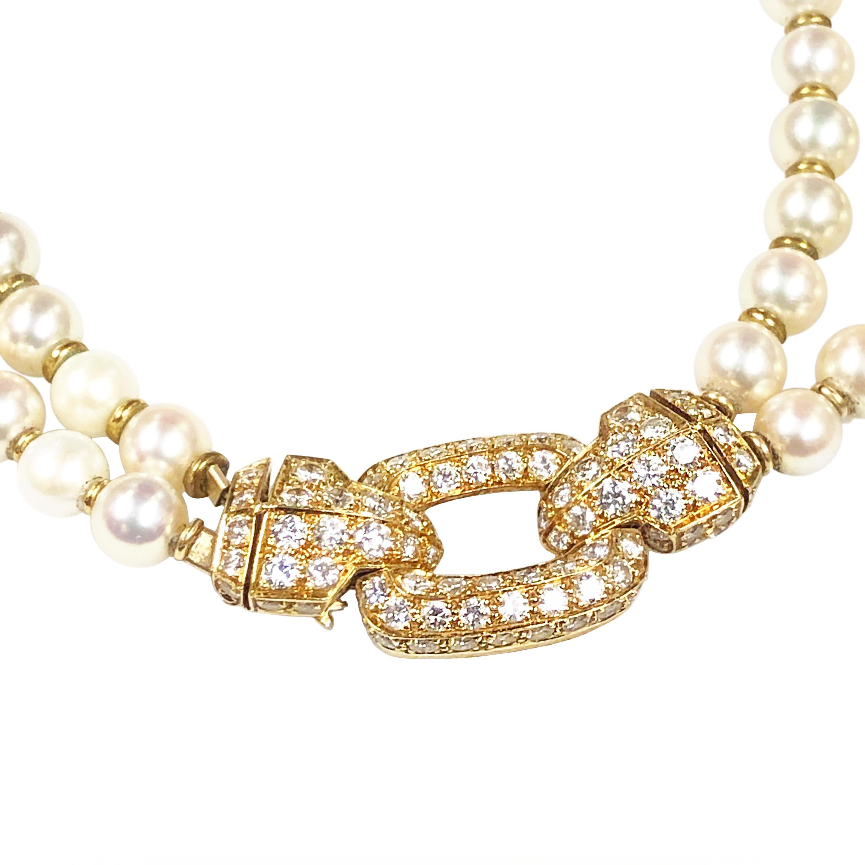 Circa 1990 Cartier 18K Yellow Gold Diamonds and Pearls Double Strand Necklace. Having 96 Round Cultured Pearls of very fine White Luster with a hint of Pink, grading as AA+ with the very slightest of any surface blemishes. Between each pearl is a