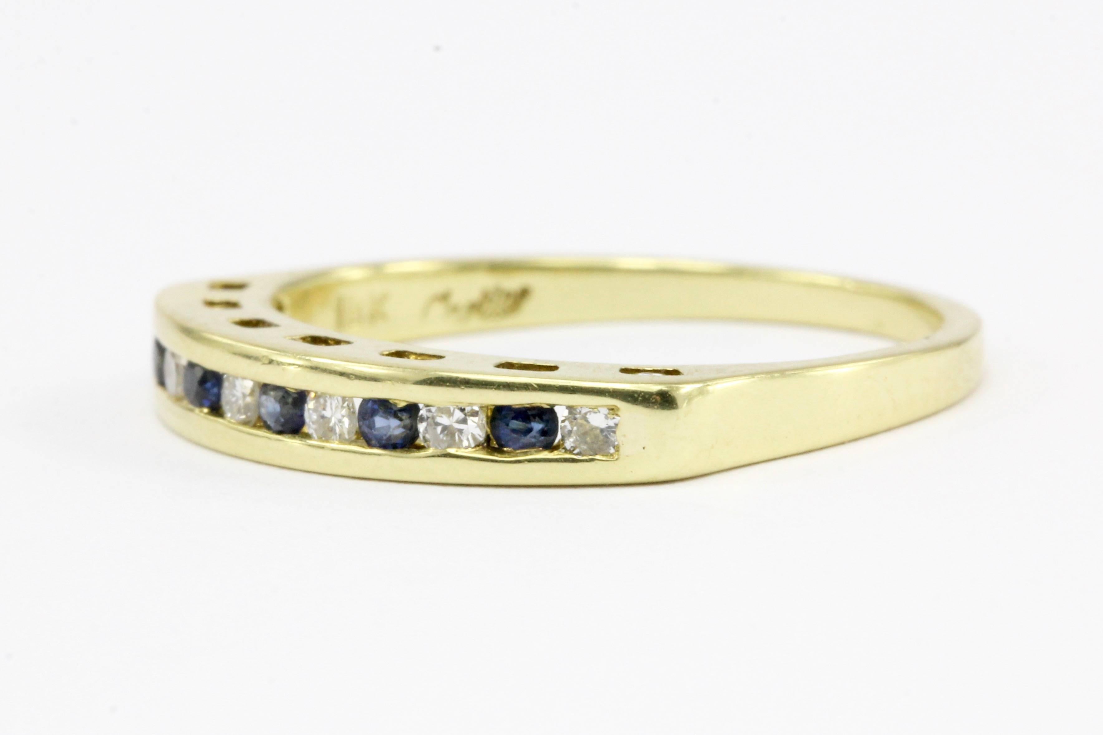 Era: Vintage 

Composition: 18K Yellow Gold 

Primary Stone: Diamonds

Primary Stone Color: G

Primary Stone Clarity: Vs1

Primary Stone Carat: .12 CTW (6 stones)

Secondary Stone: Natural heated sapphire

Secondary Stone Carat: .15 CTW (5