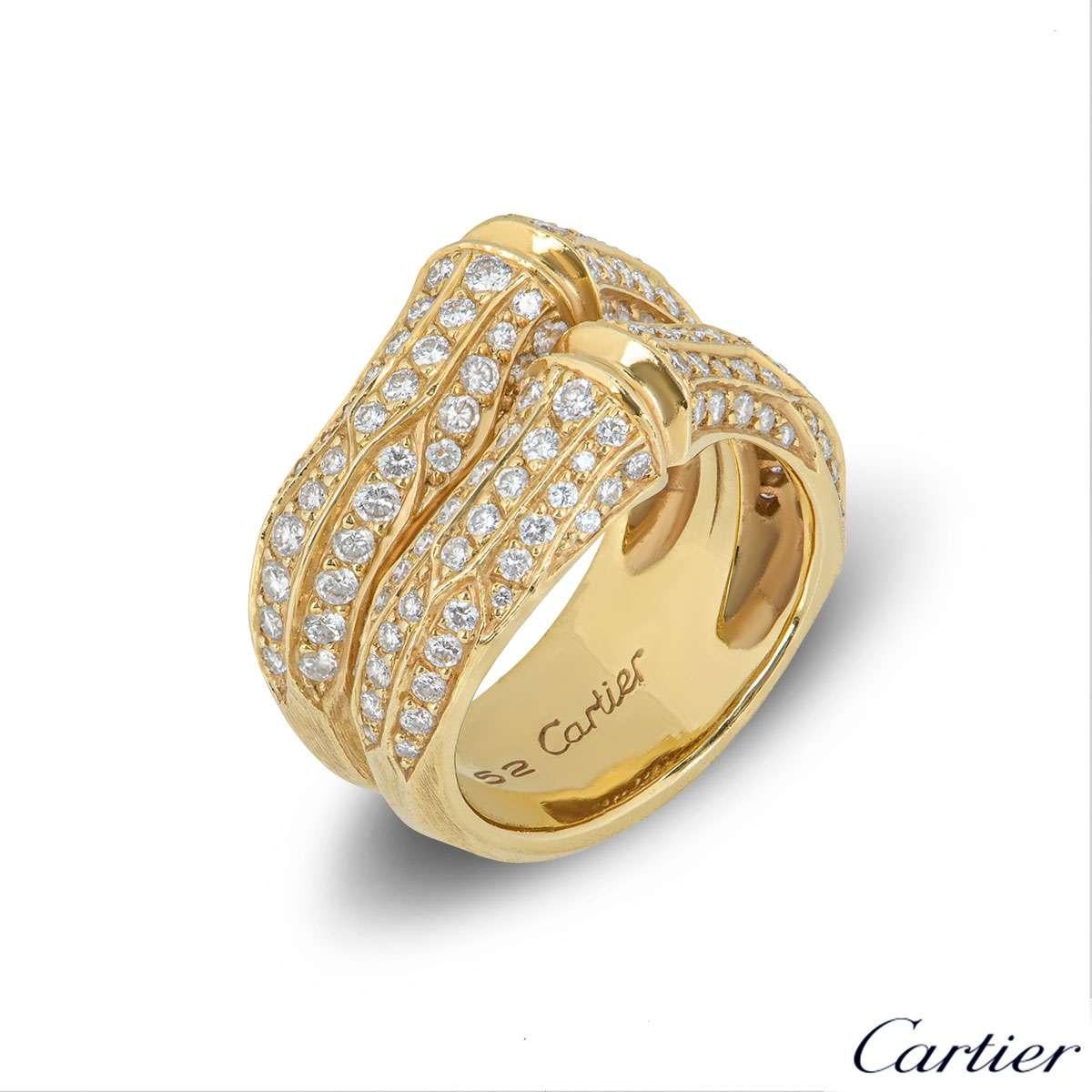 An 18k yellow gold diamond set ring from the Cartier Bamboo collection. The ring is set to the centre with 2 iconic bamboo motifs, each pave set with round brilliant cut diamonds totalling approximately 1.65ct. The 12mm ring features a brushed