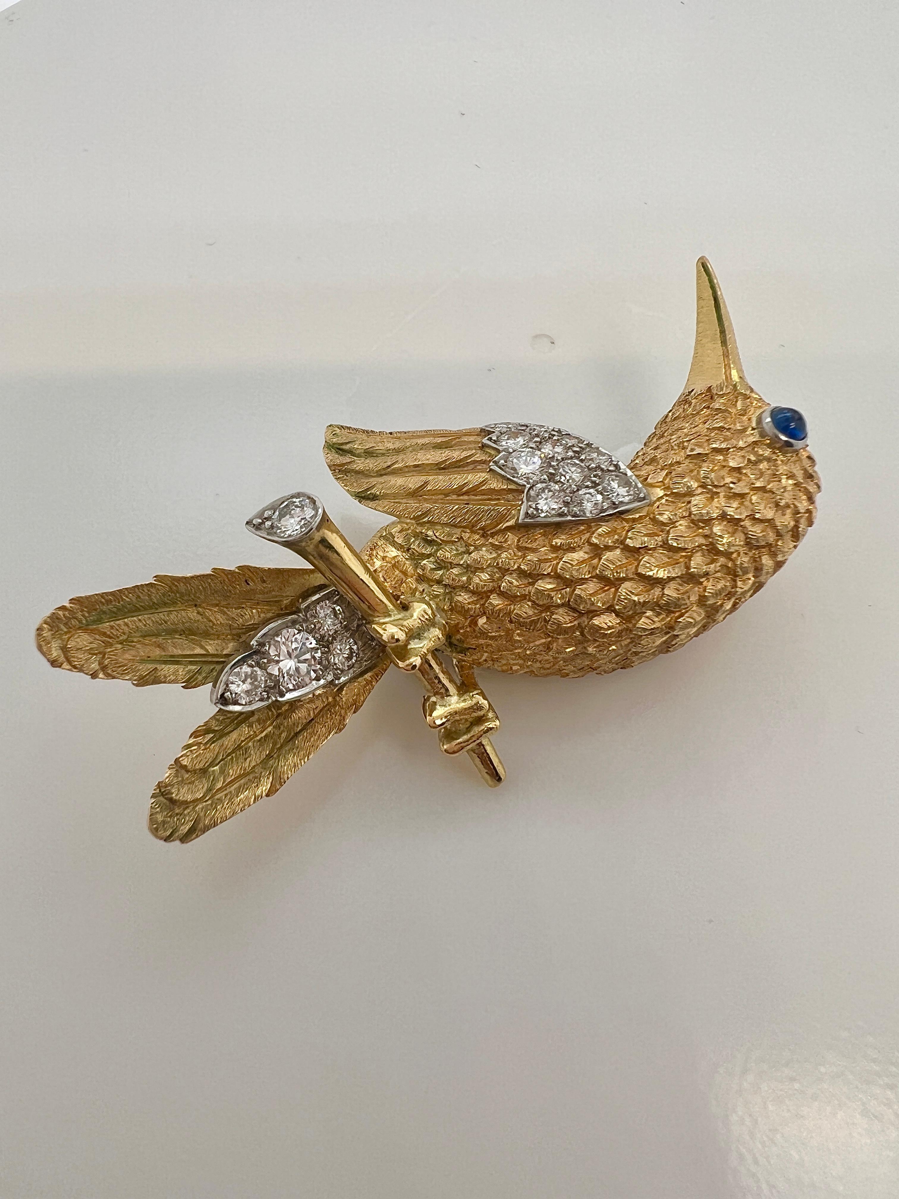Cartier Yellow Gold Diamond Bird Brooch.


Details:
18k yellow gold, 16 brilliant-cut diamonds approx. 0.80 ct, one sapphire for the eye. Marked: Cartier France. Weight: 13.1 grams. Length 4.7cm. Circa 1960s. Measurements: 2''x1''. Hallmarked